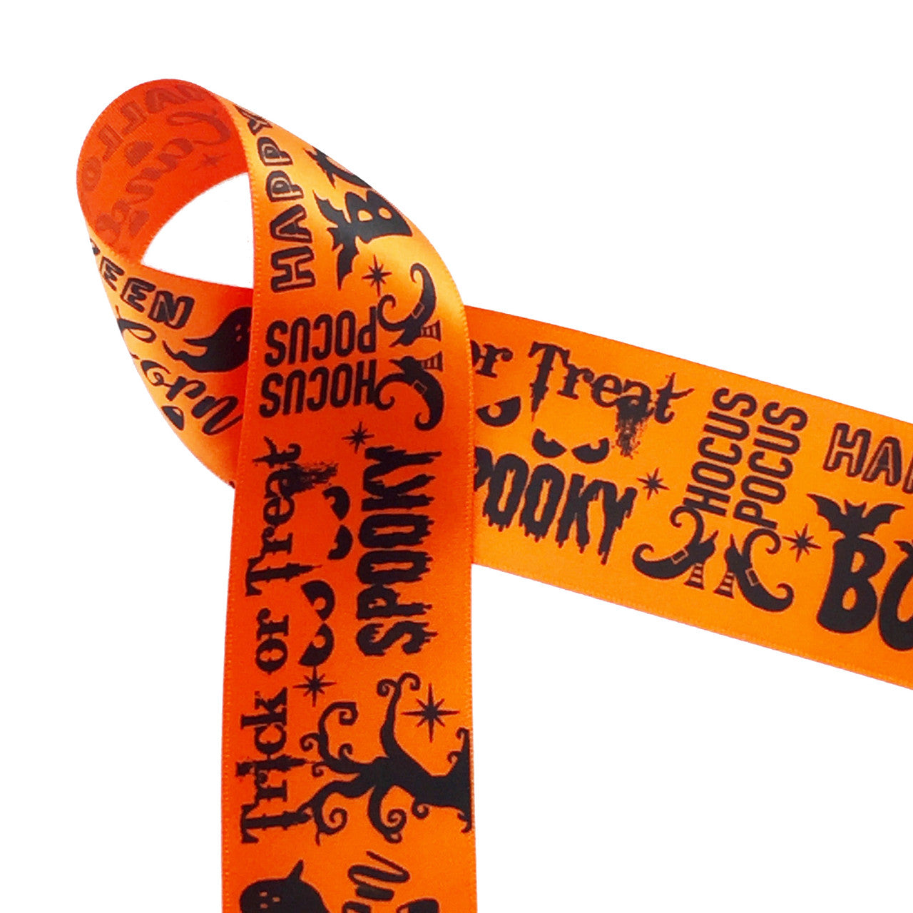 Halloween word block ribbon printed with black ink on 1.5" orange single face satin ribbon is an ideal ribbon for decorating or tying towers of treats!