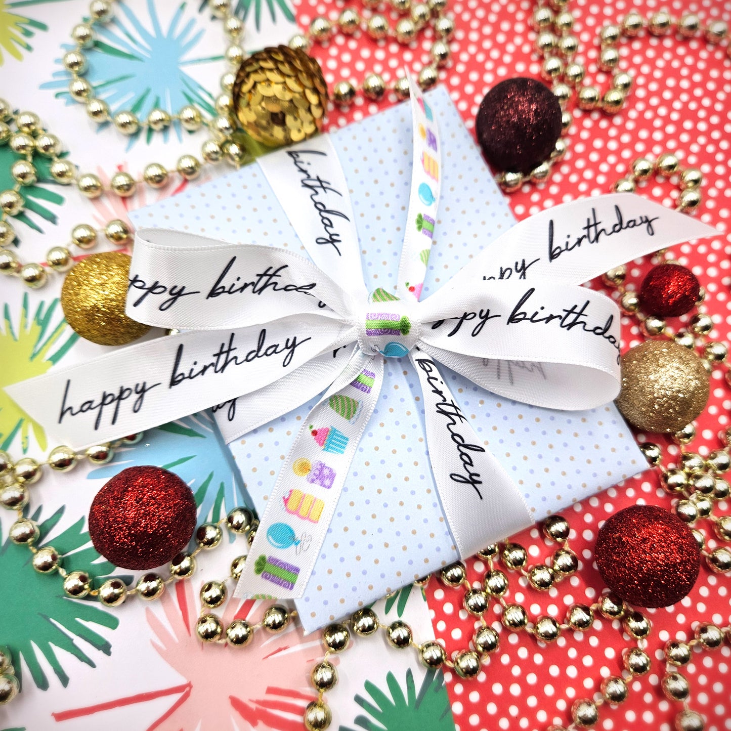 Happy Birthday Ribbon in black text on 5/8" and 7/8" white single face satin