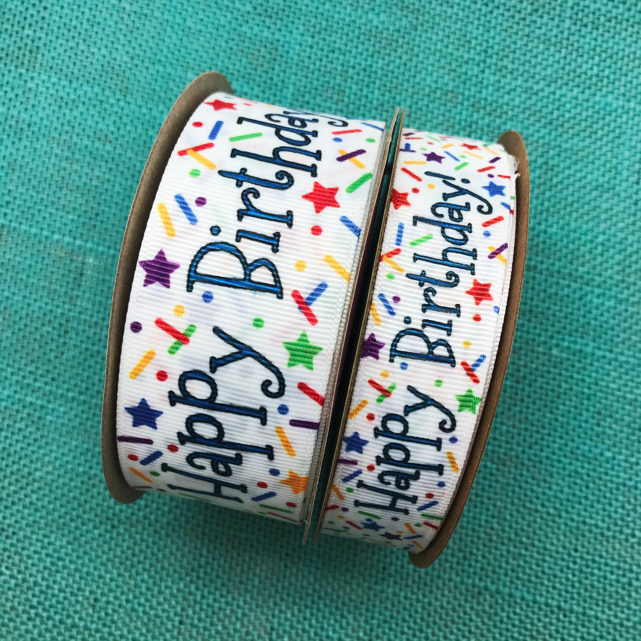 Our Happy Birthday ribbon comes in two sizes! We have 1.5" and 7/8" for larger and smaller projects!