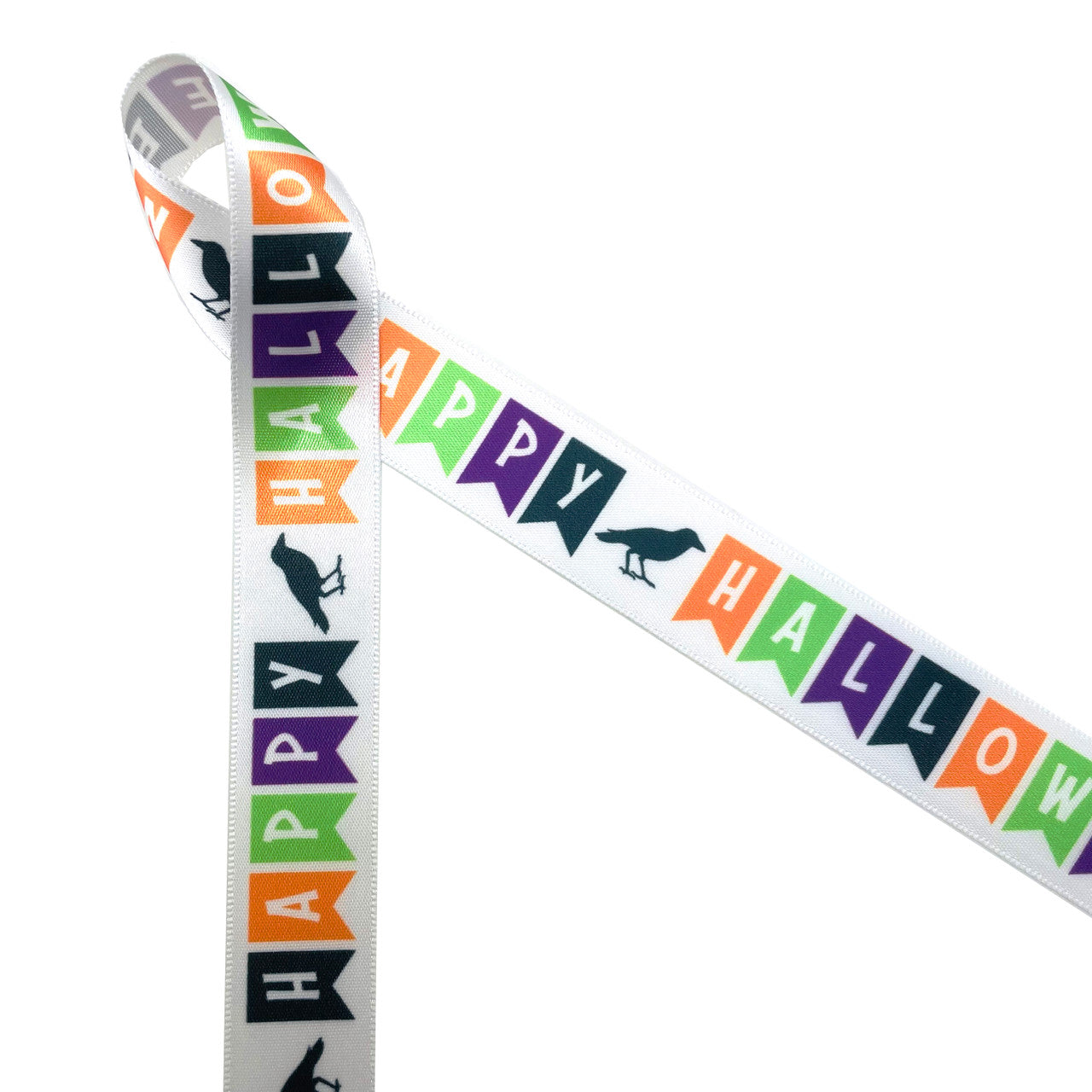 Happy Halloween banner ribbon with banners of orange, purple, lime green and black wit a black raven printed on 5/8" white single face satin is ideal for so many Halloween events. This is a great ribbon for gift wrap, gift baskets, cookies, cake pops, candy shops and chocolatiers. This is an ideal ribbon for party decor, party favors, crafts, bows, scrap booking and quilting projects. All our ribbon is designed and printed in the USA