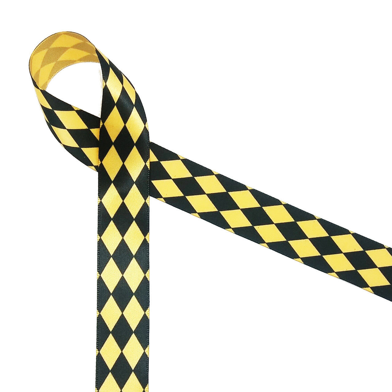 Harlequin print in black on 7/8" yellow single face satin ribbon, 10 yards