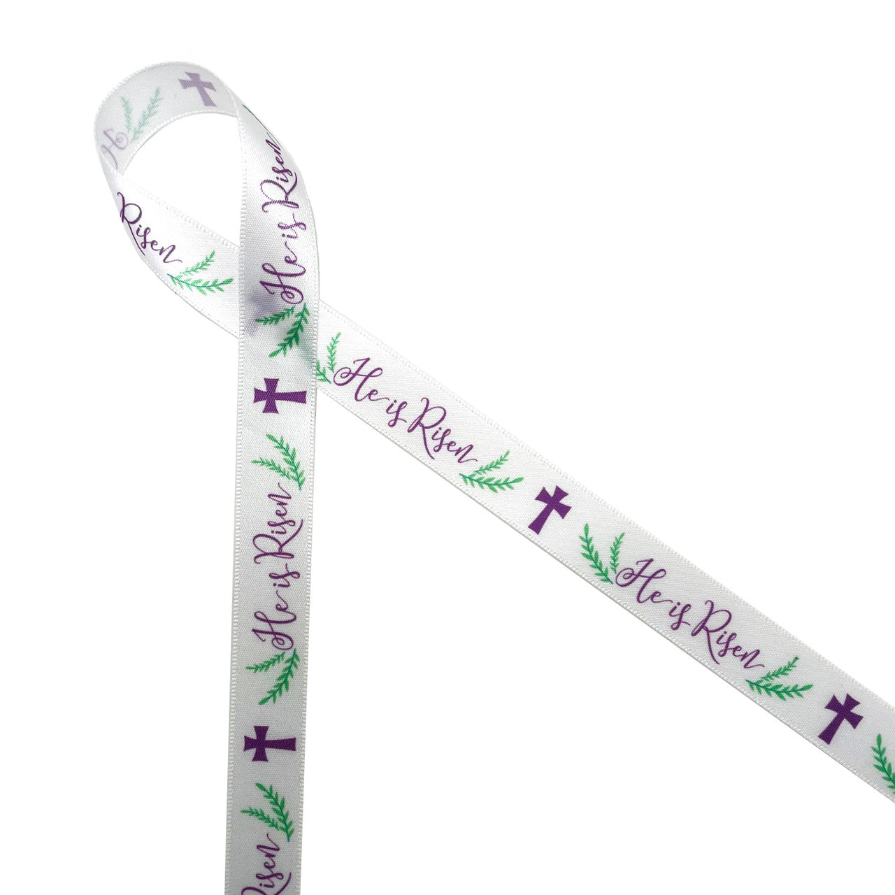 Easter He is Risen ribbon is the Christian expression of the Easter season. Our He is Risen ribbon in purple and green is printed on 5/8" white single face satin ribbon. This is the ideal ribbon for Easter Sunday services, Christian Easter baskets, gift wrap, table decor and crafts. Be sure to have  this ribbon on  hand for Easter Brunch and table decor! Our ribbon is designed and printed in the USA