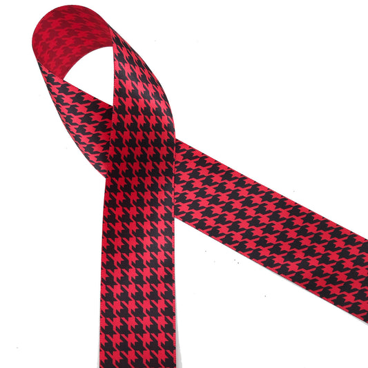Houndstooth check in black printed on 1.5" red single face satin ribbon is a classic print for Holidays and everyday use. This is an ideal ribbon for hair bows,  holiday gifts, wreath making, decorating and sewing projects! Our ribbon is designed and printed in the USA