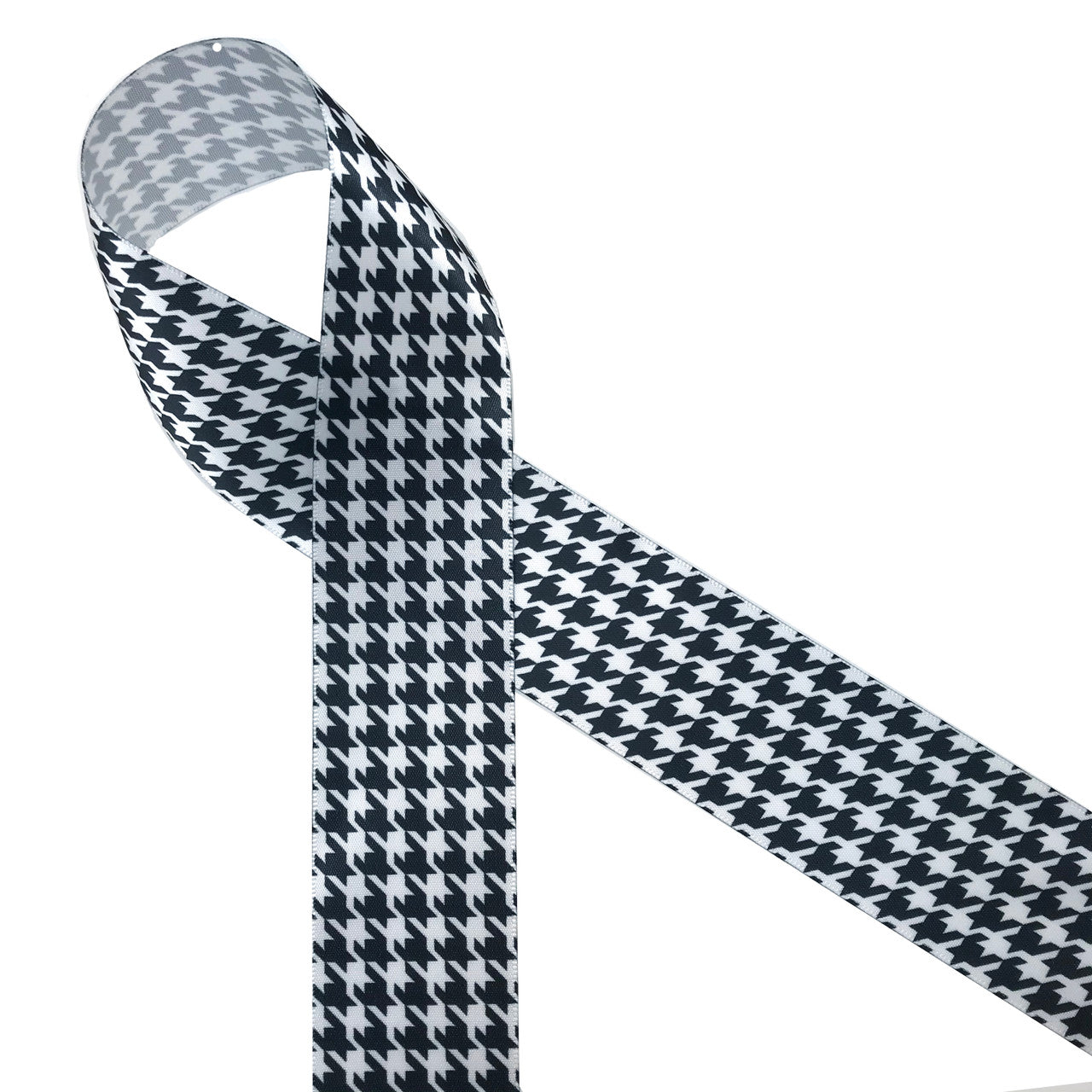 Black and white houndstooth check printed on 1.5" white single face satin ribbon is a classic design for Holiday gift wrap, Father's day and Alabama football. All our ribbons are designed and printed in the USA