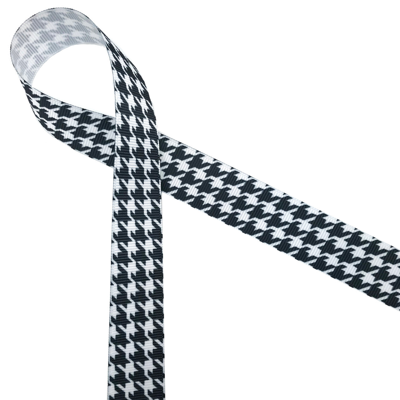 Black and white houndstooth check printed on 1.5" white grosgrain ribbon is a classic design for Holiday gift wrap, Father's day and Alabama football. All our ribbons are designed and printed in the USA