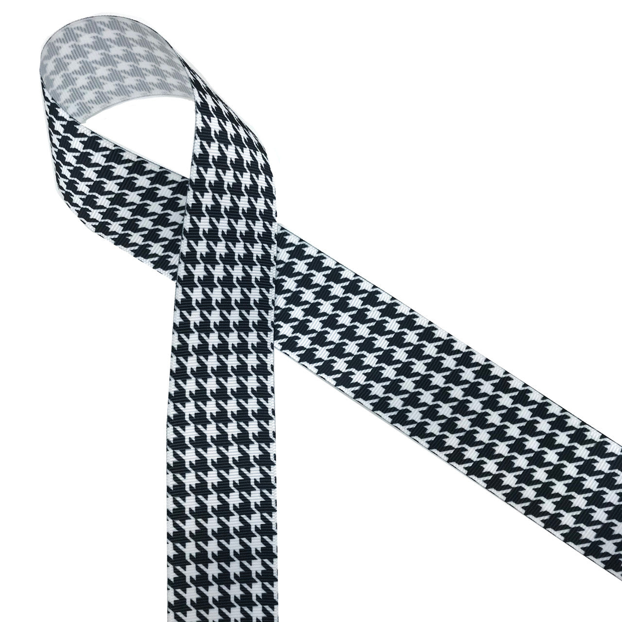 Black and white houndstooth check printed on 1.5" white grosgrain ribbon is a classic design for Holiday gift wrap, Father's day and Alabama football. All our ribbons are designed and printed in the USA