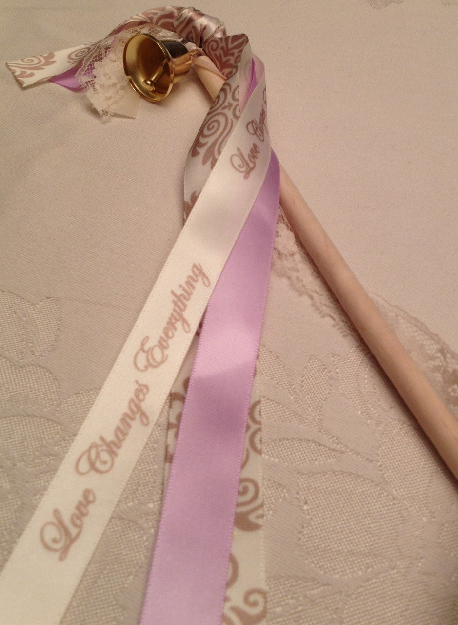 We added our Love Changes Everything ribbon to this wedding wand! Waving this pretty wand added so much fun to their entrance to the reception!