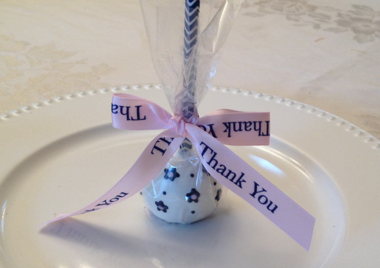 This cake pop is adorned with our navy blue and light pink Thank You ribbon! Your guests will feel very special taking home an elegant cake pop is such a pretty wrapping.