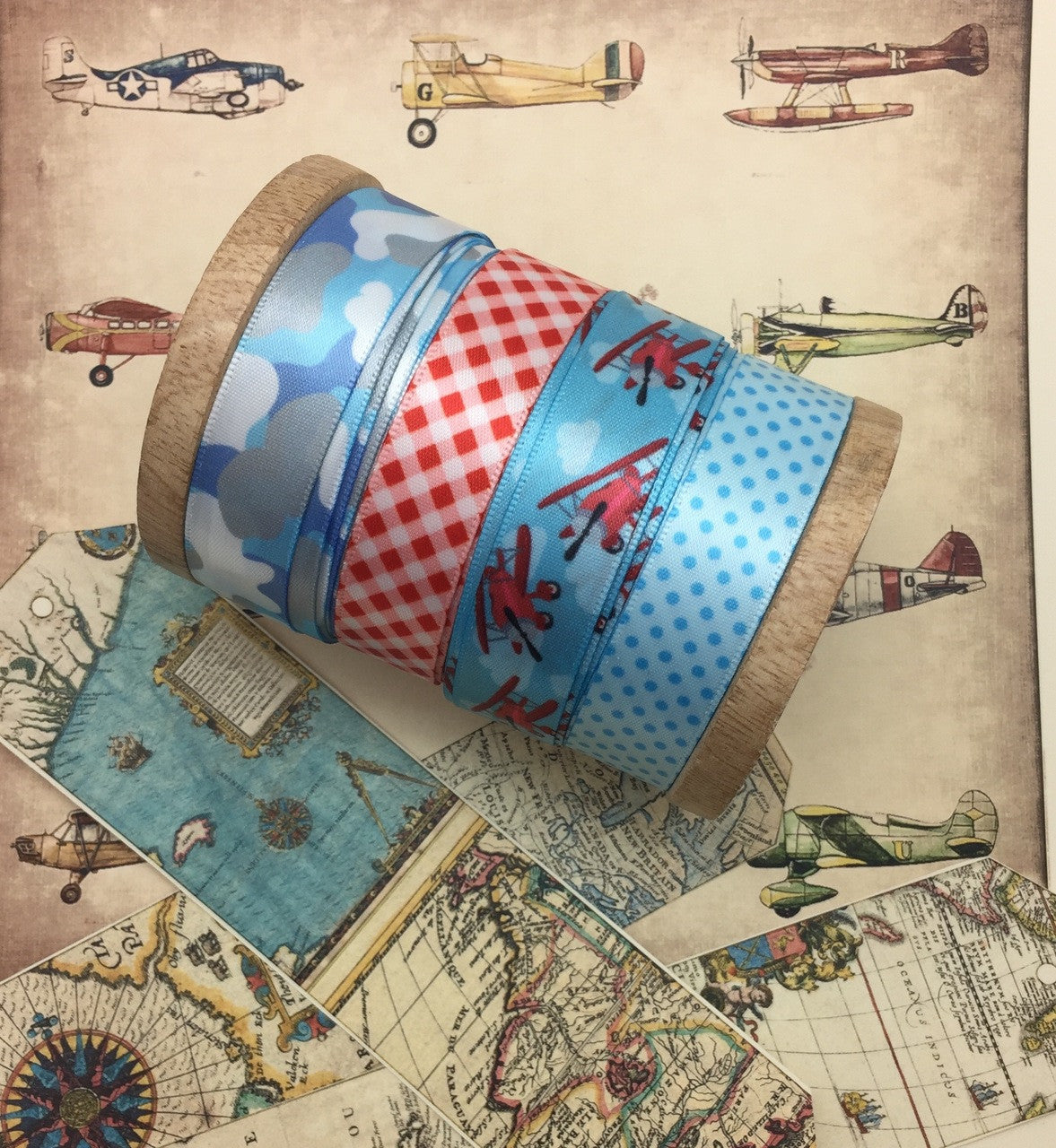 Mix and match our air plane ribbon with baby blue camouflage, red gingham, and blue on blue pin dots for a beautiful addition to an aviation themed party! 