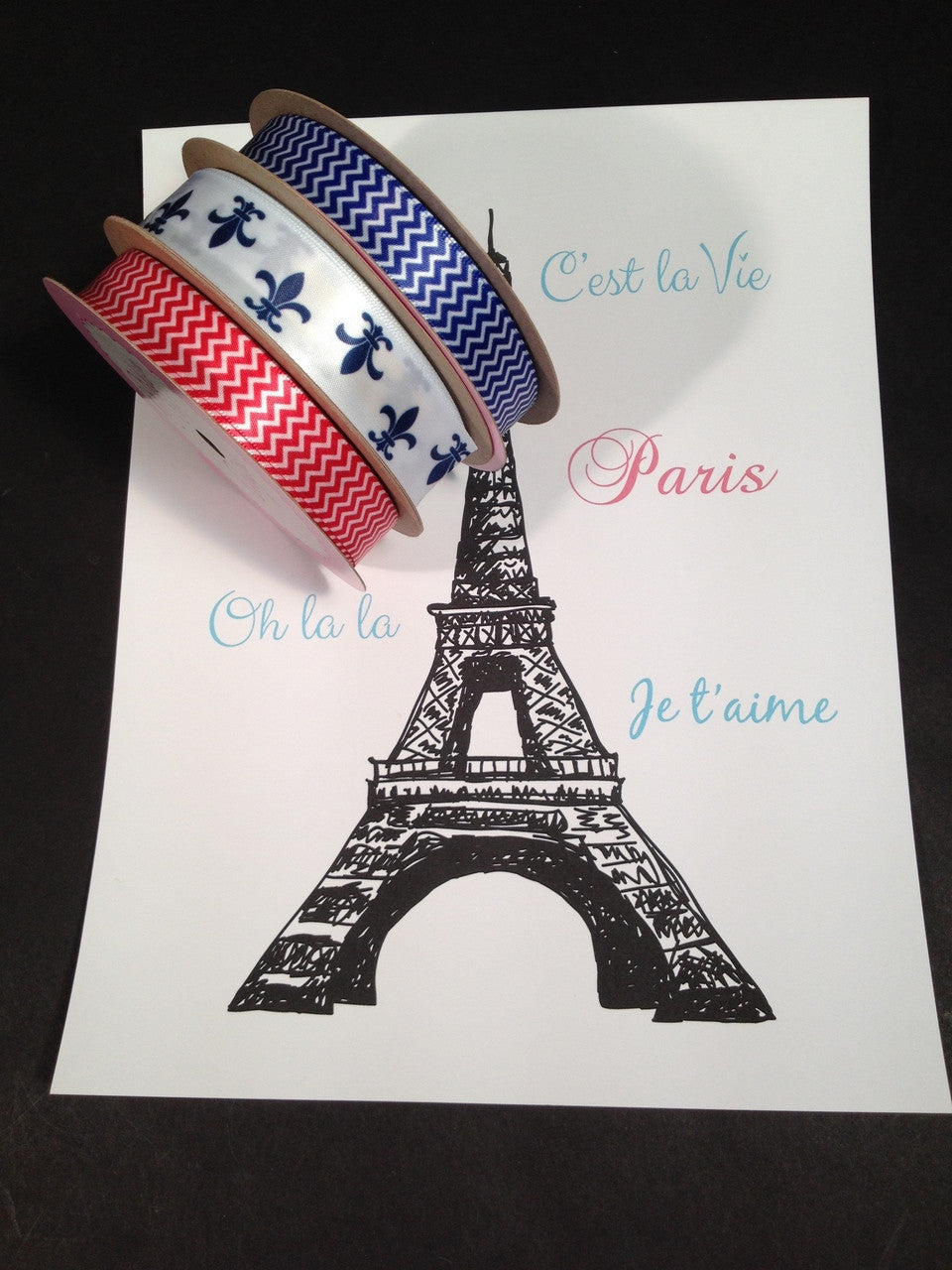 Say Oui! to our classic French Fleur di Lis ribbon in Navy blue and white!