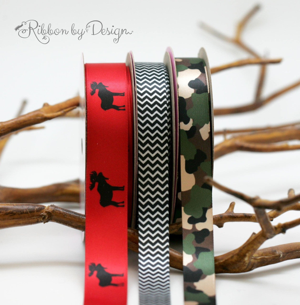Paired with our Moose silhouette ribbon, our camouflage ribbon in green and tan makes a great Fall party theme!
