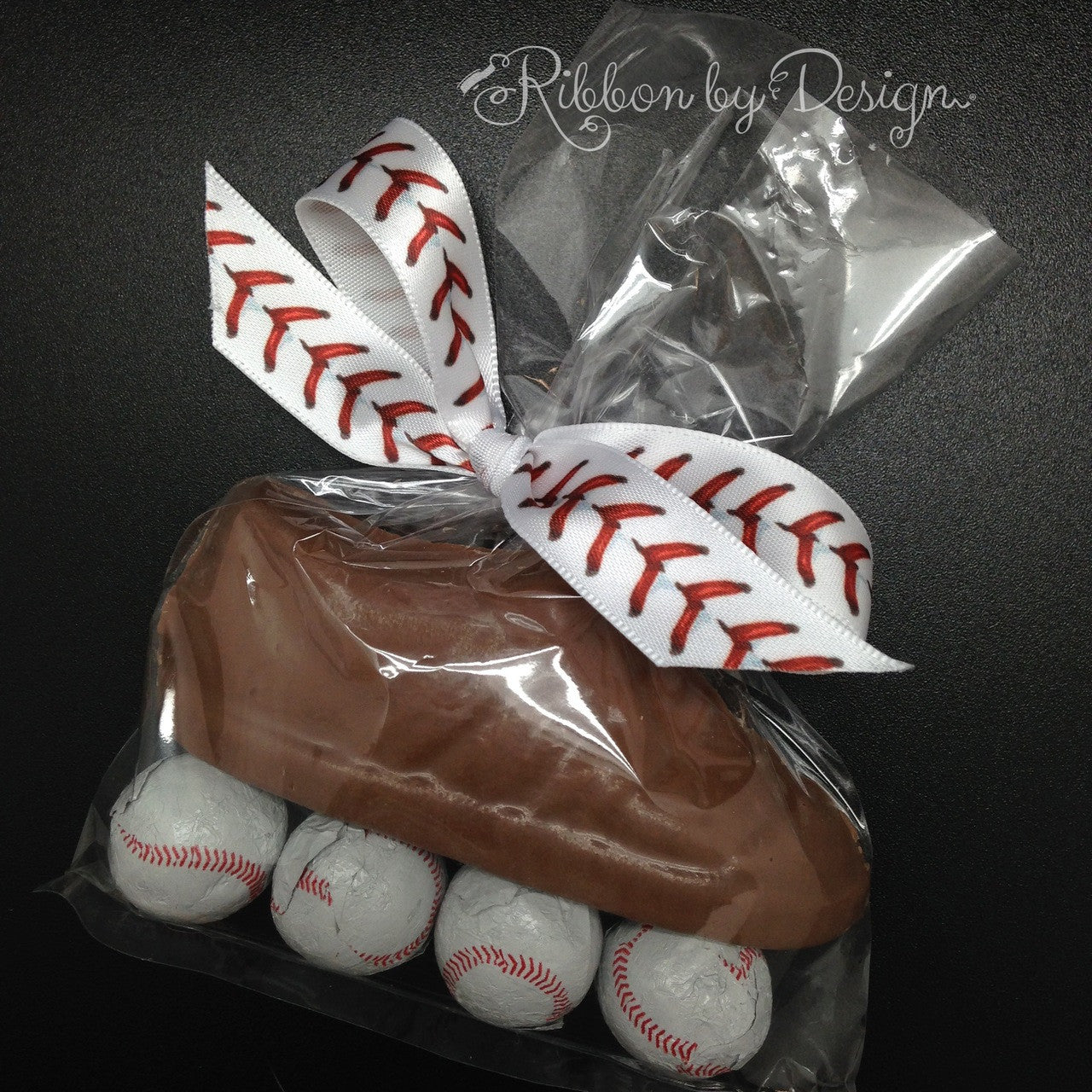 This fun baseball favor of a chocolate cleat with chocolate baseballs  is tied with our fun baseball stitch ribbon.