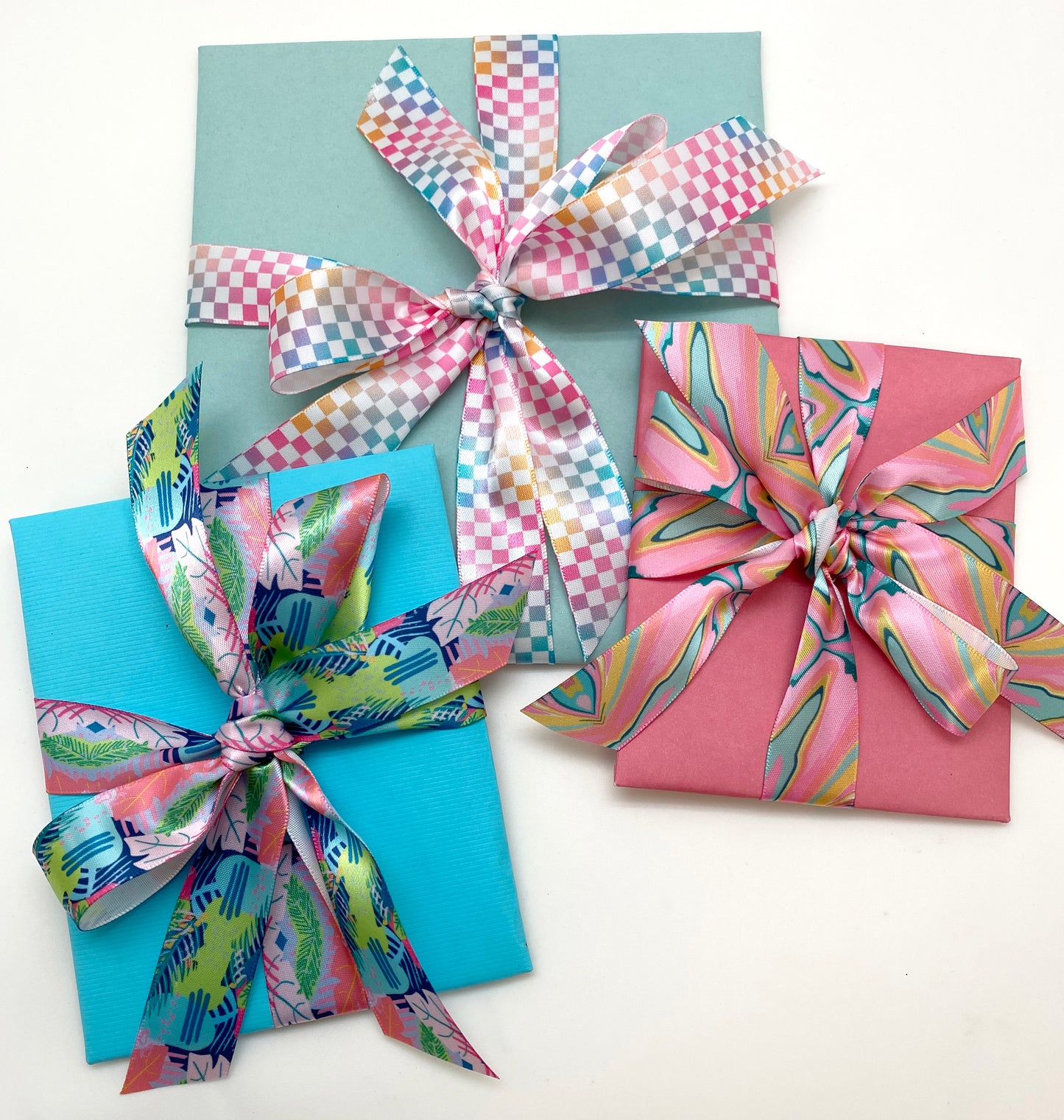 Pastel Marbled ribbon in shades of pink, yellow and blue printed on 7/8"white satin and grograin