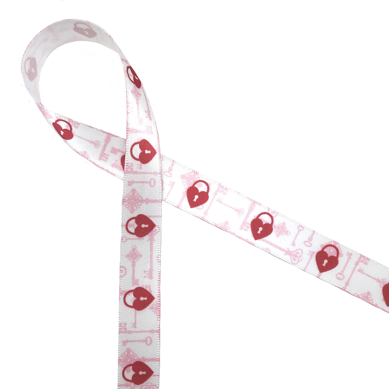 Red heart shaped locks run along a background of pink skeleton keys on 5/8" white single face satin. Be sure to give the key to your heart message to your special person with this fun Valentine ribbon!