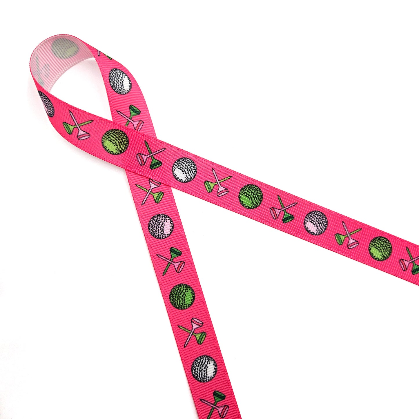 Golf ribbon Women's golf featuring golf balls and crossed tees on a hot pink background printed on 5/8" and 7/8" white grosgrain or white satin