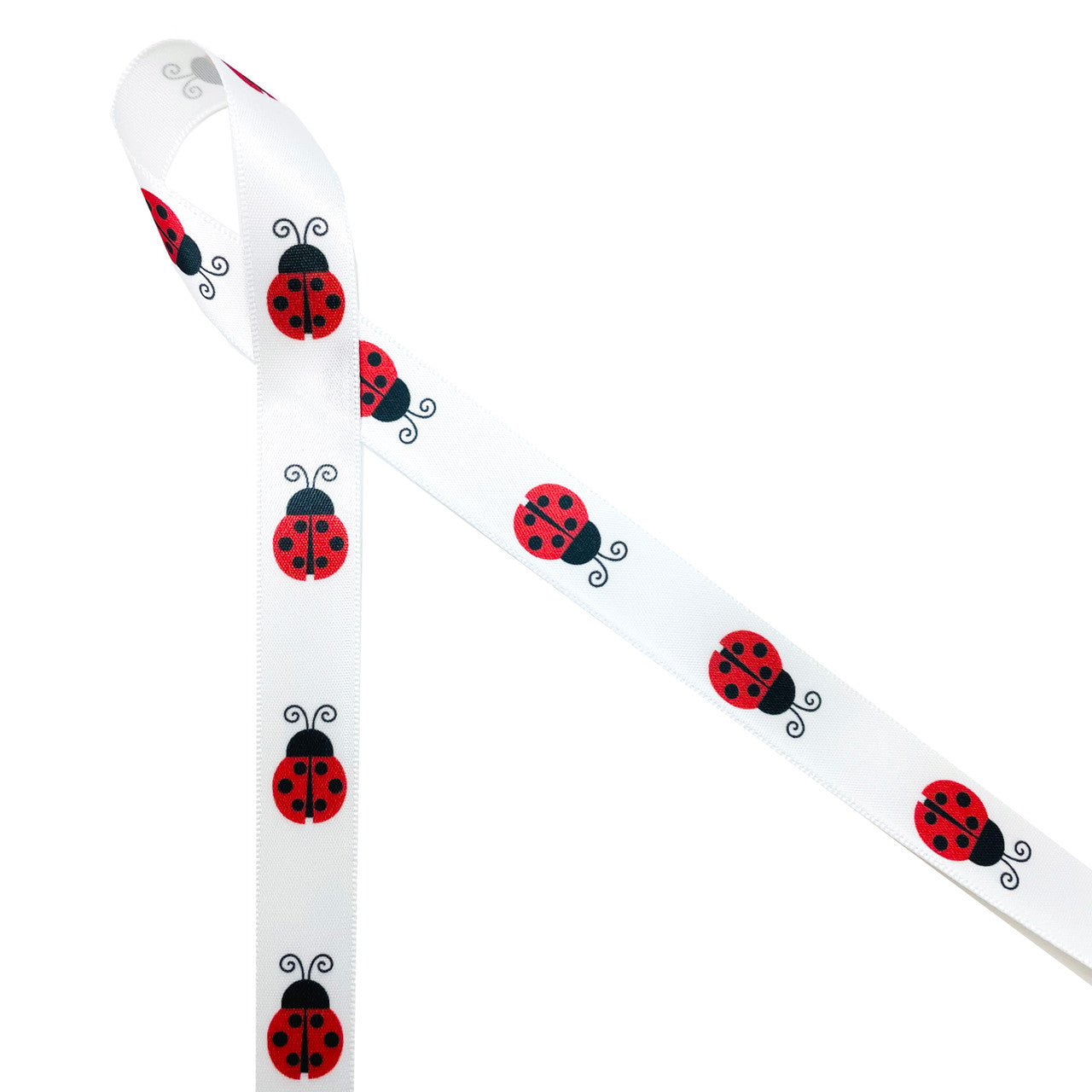 Ladybugs in a row on 5/8" white single face satin.