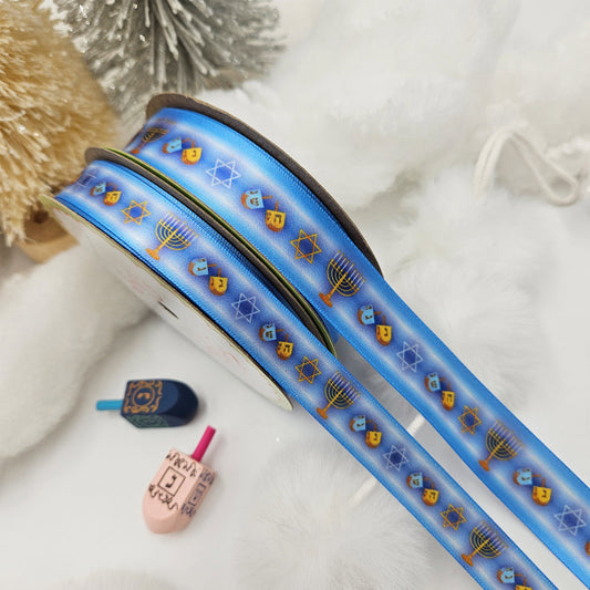 Hanukkah Ribbon in shades ofLight  blue with Menorahs, dreidels and Star of David in a row for gifts printed on 5/8" and 7/8" white satin