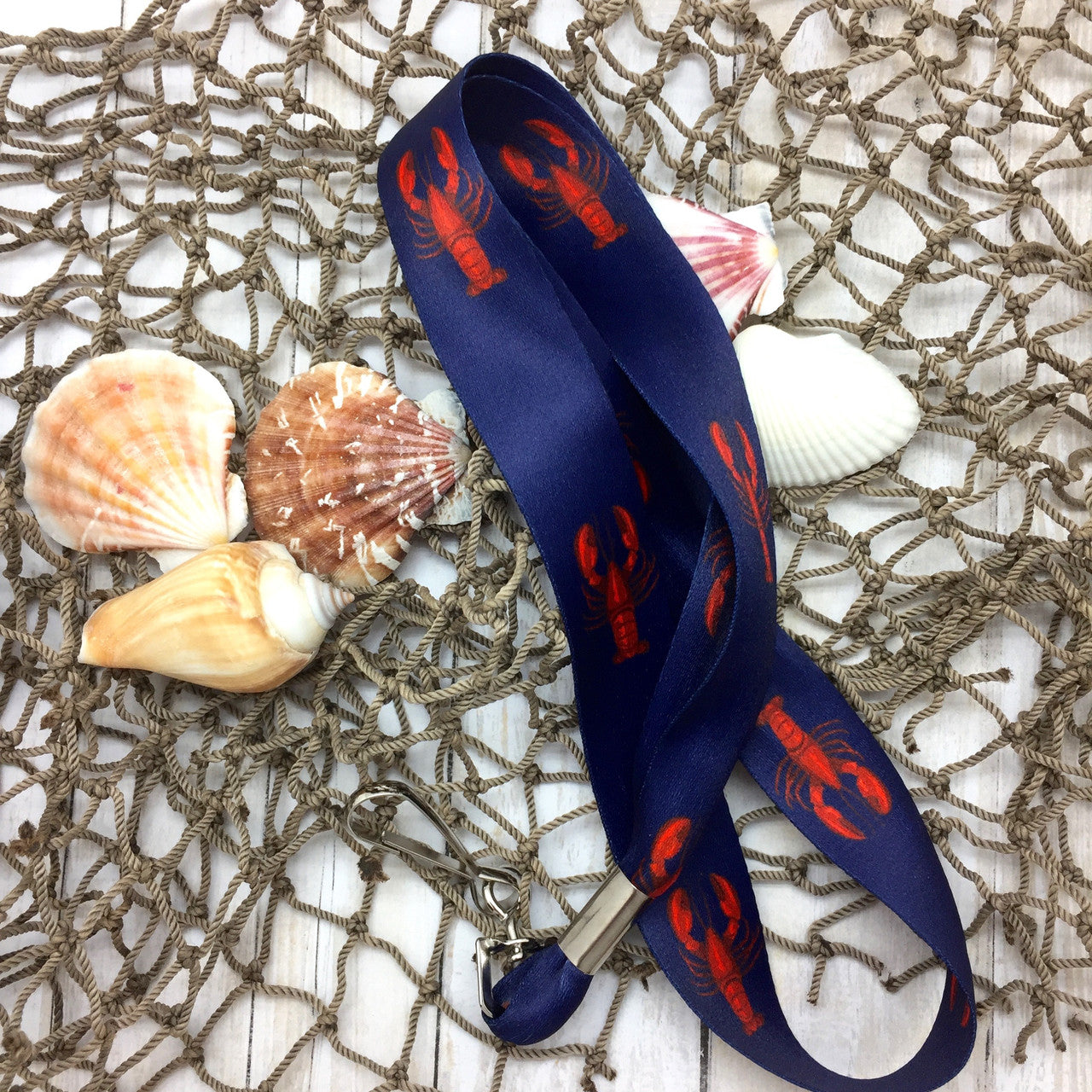 Make our lobster ribbon part of your Summer fun! This is a great lanyard for family or corporate clambakes and a great souvenir to remember the event!