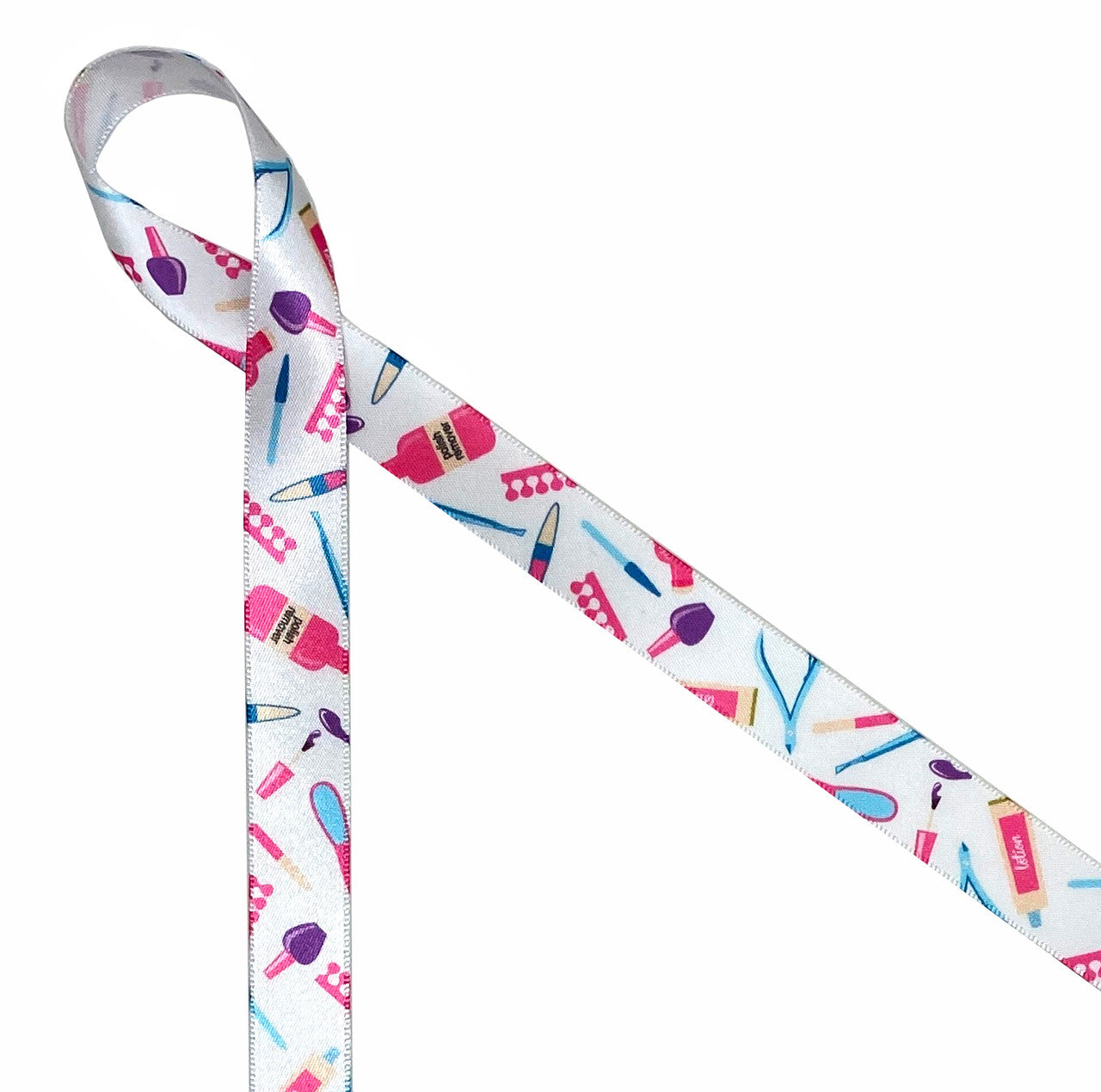 Manicure themed ribbon featuring purple nail polish, nail files, pink toe separators, clippers, buffers and more tools of the trade printed on 5/8" white single face satin. This is such a fun ribbon for spa themed parties, gifts and bridal showers!