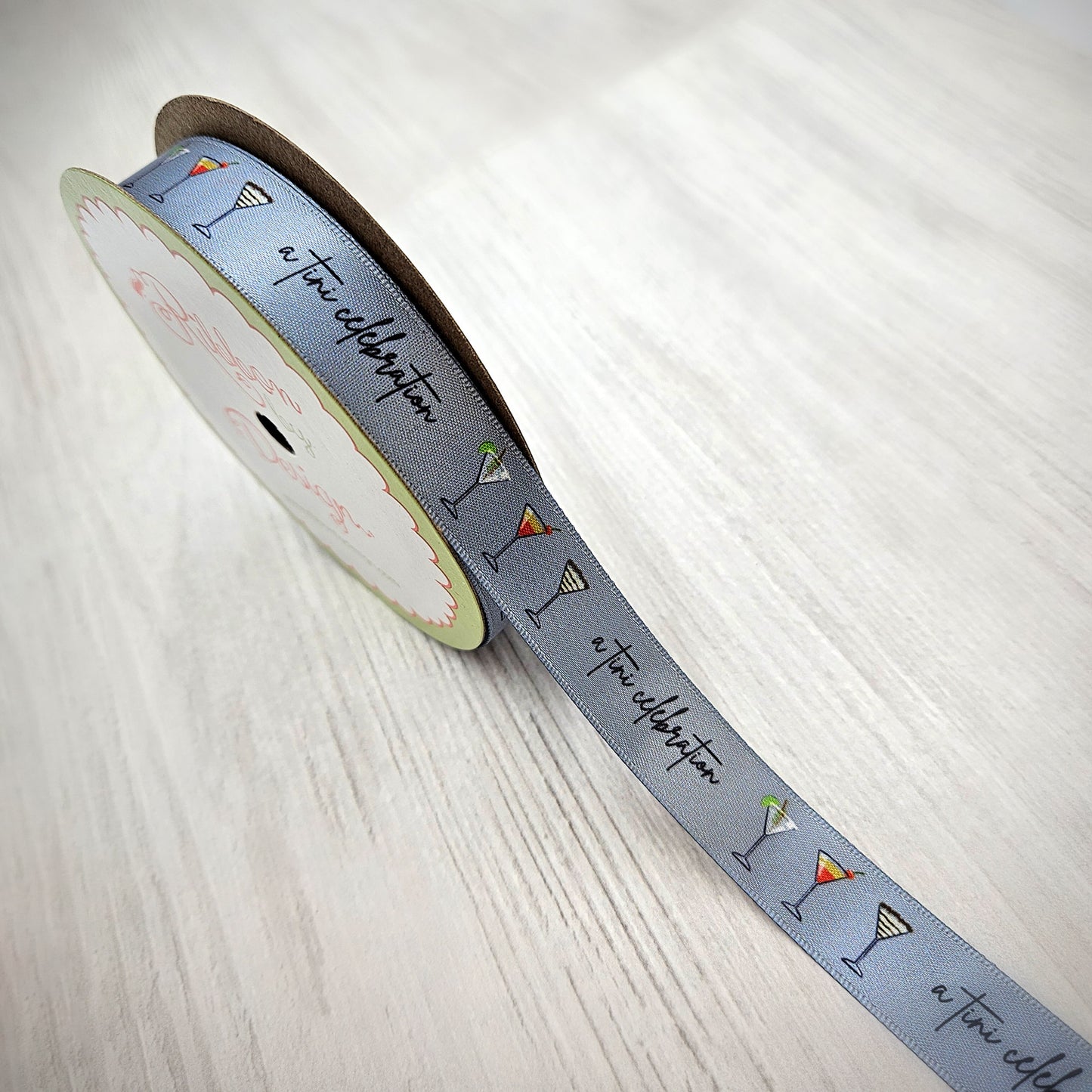 Martini Ribbon featuring Martini Glasses with the tag line A tini celebration on a silver gray background on 5/8" single face satin