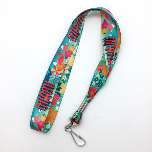 Bright, fun and cheery is our Miami themed lanyard! Perfect for carrying keys or employment ID's! Designed, printed and assembled in the USA