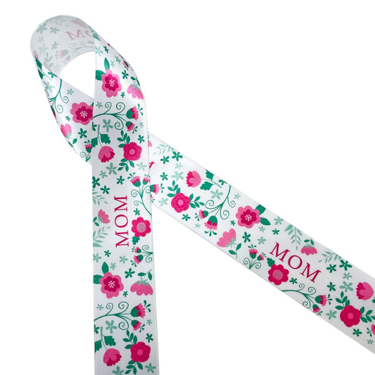 Mom in pink tosses with pink, rose gold and sage floral designs printed on 1.5" white single face satin ribbon is perfect for celebrating Mother's Day! This is a perfect ribbon for gift wrap, Mother's Day brunch decor, floral design, table design and crafts! Be sure to have this ribbon on hand for all the special Moms in your life! Our ribbon is designed and printed in the USA