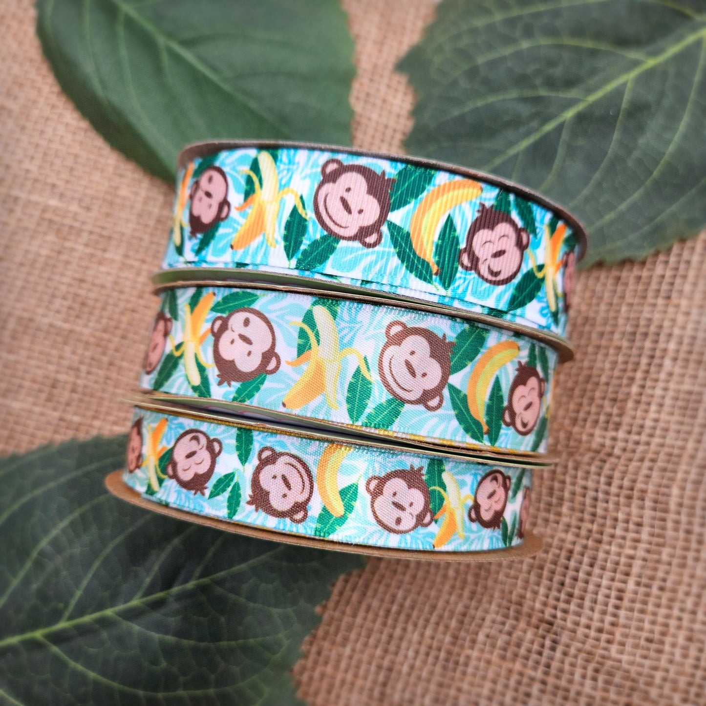 Monkeys and bananas ribbon with palm fronds on 7/8" white single face satin and grosgrain