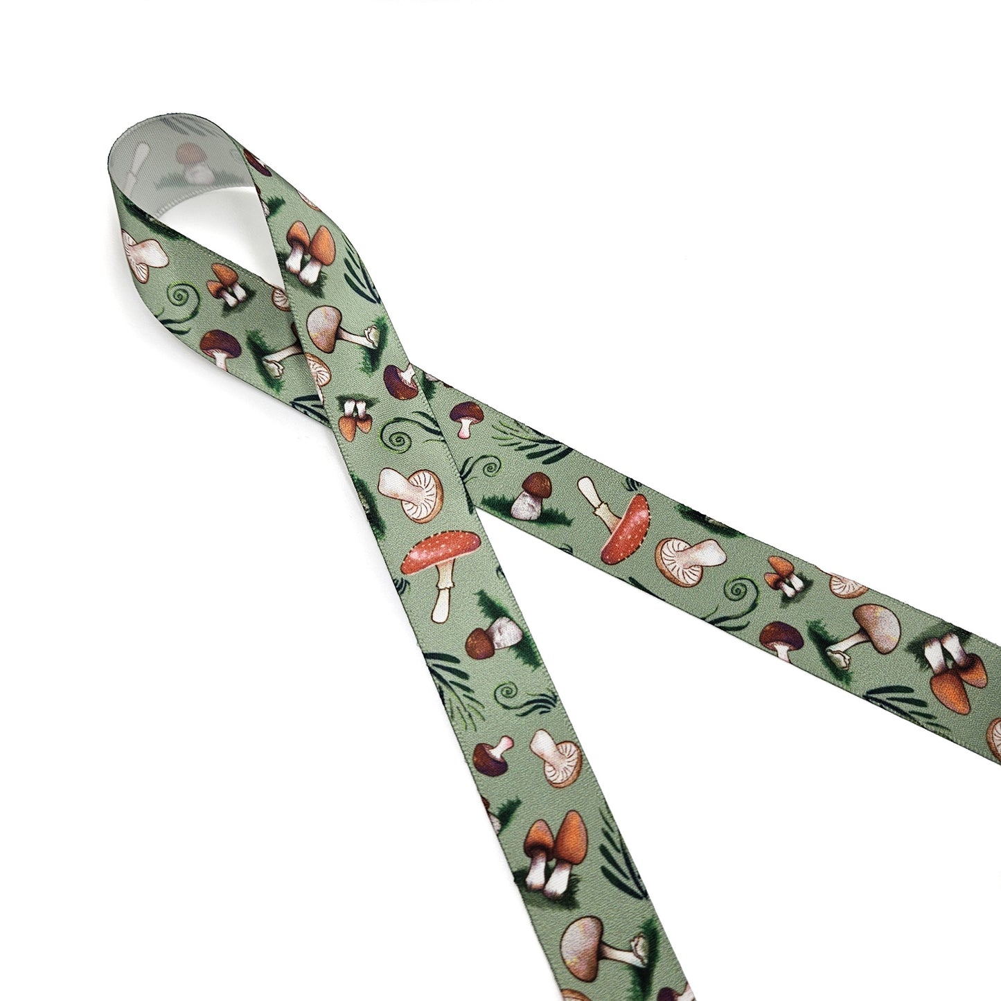 Mushroom ribbon with a variety of mushrooms tossed with forrest fern and flora printed on 7/8" white single face satin