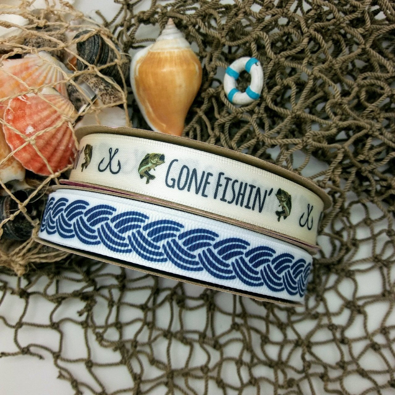 Gone Fishin' pairs beautifully with our navy rope ribbon! Be sure to have these on hand for you next seaside or lake side party!