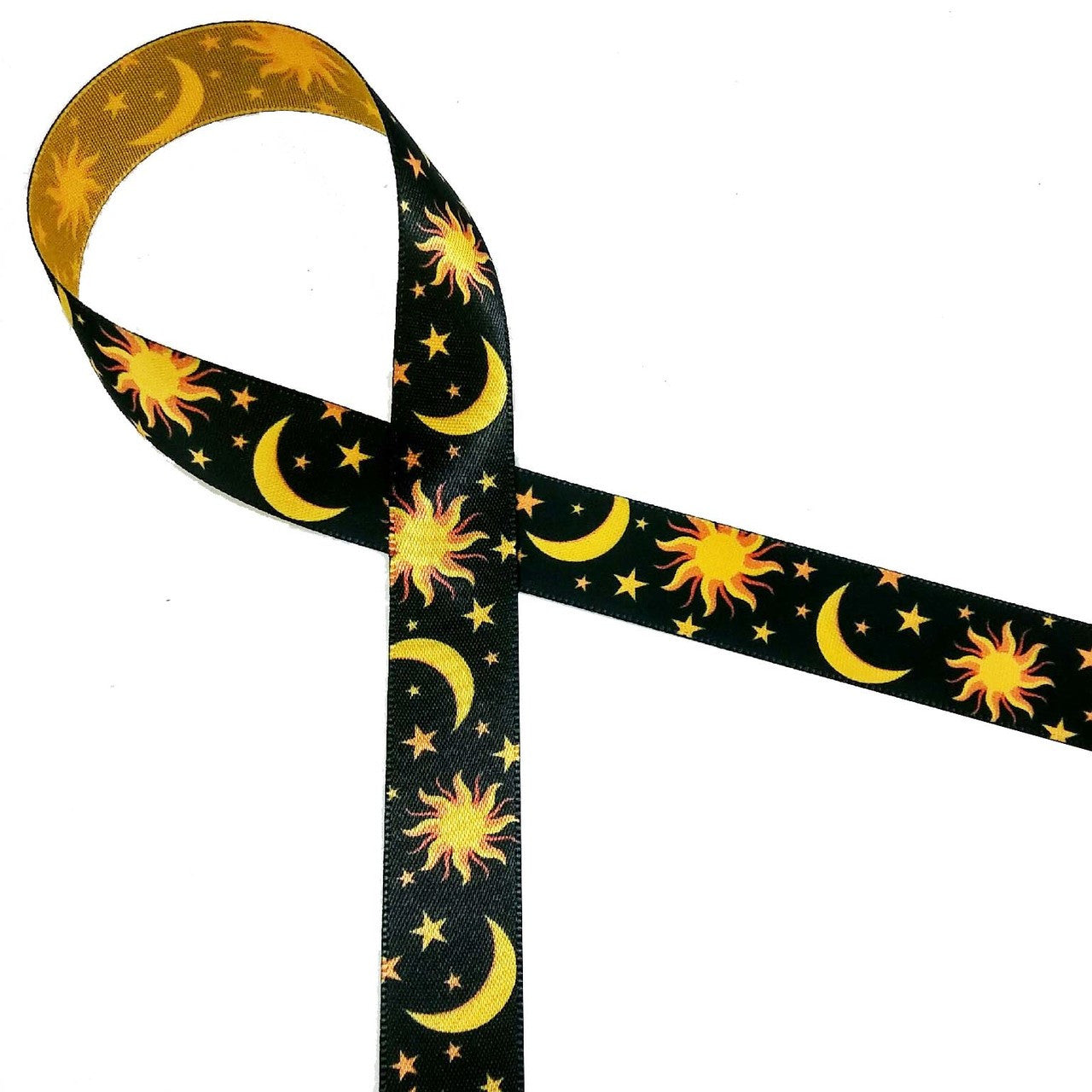The Sun, Moon and Stars on a black background printed on 5/8" gold single face satin ribbon is a beautiful ribbon for the most thoughtful of friends.
