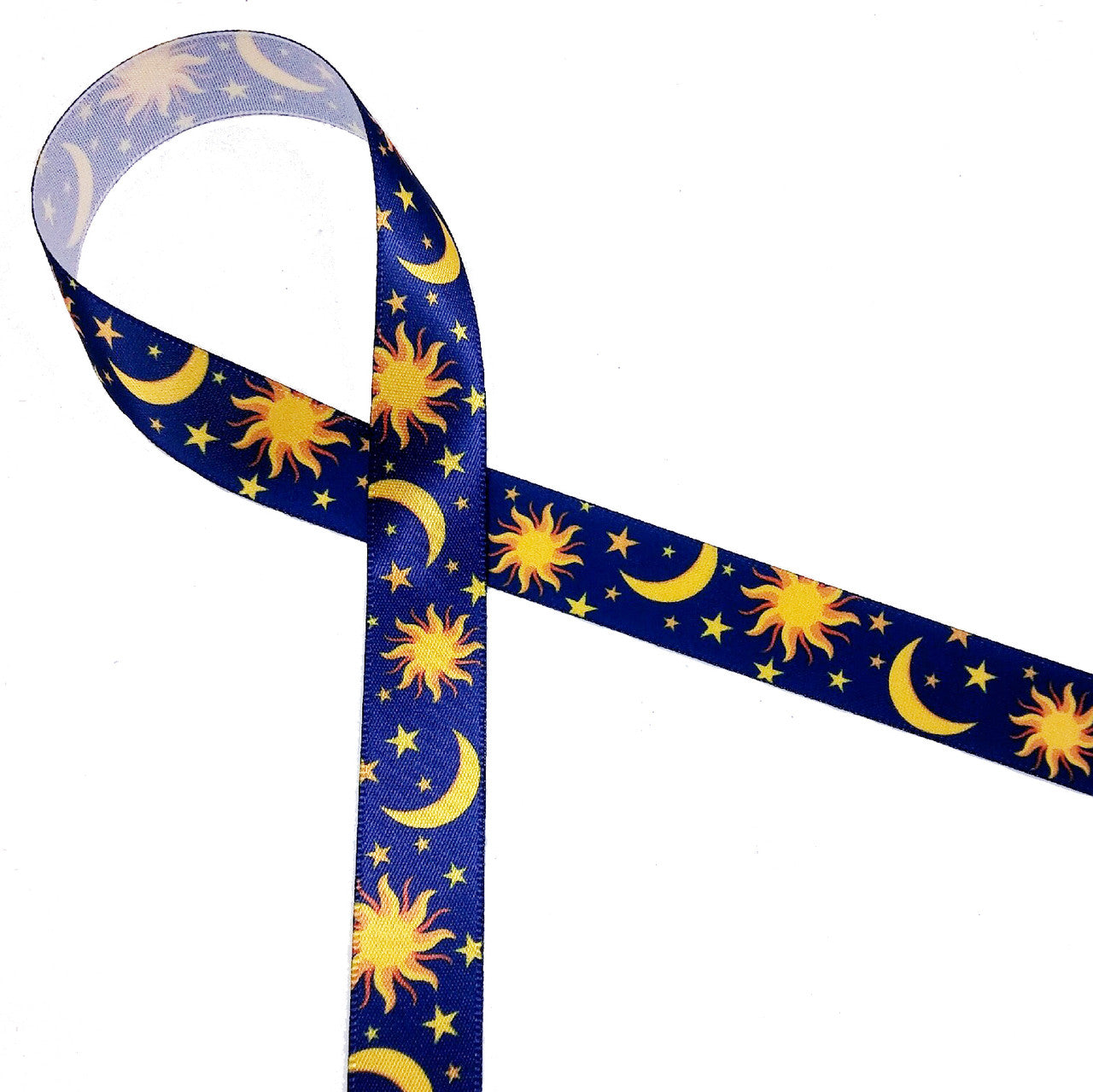 Sun, moon and stars ribbon on a navy background printed on 5/8