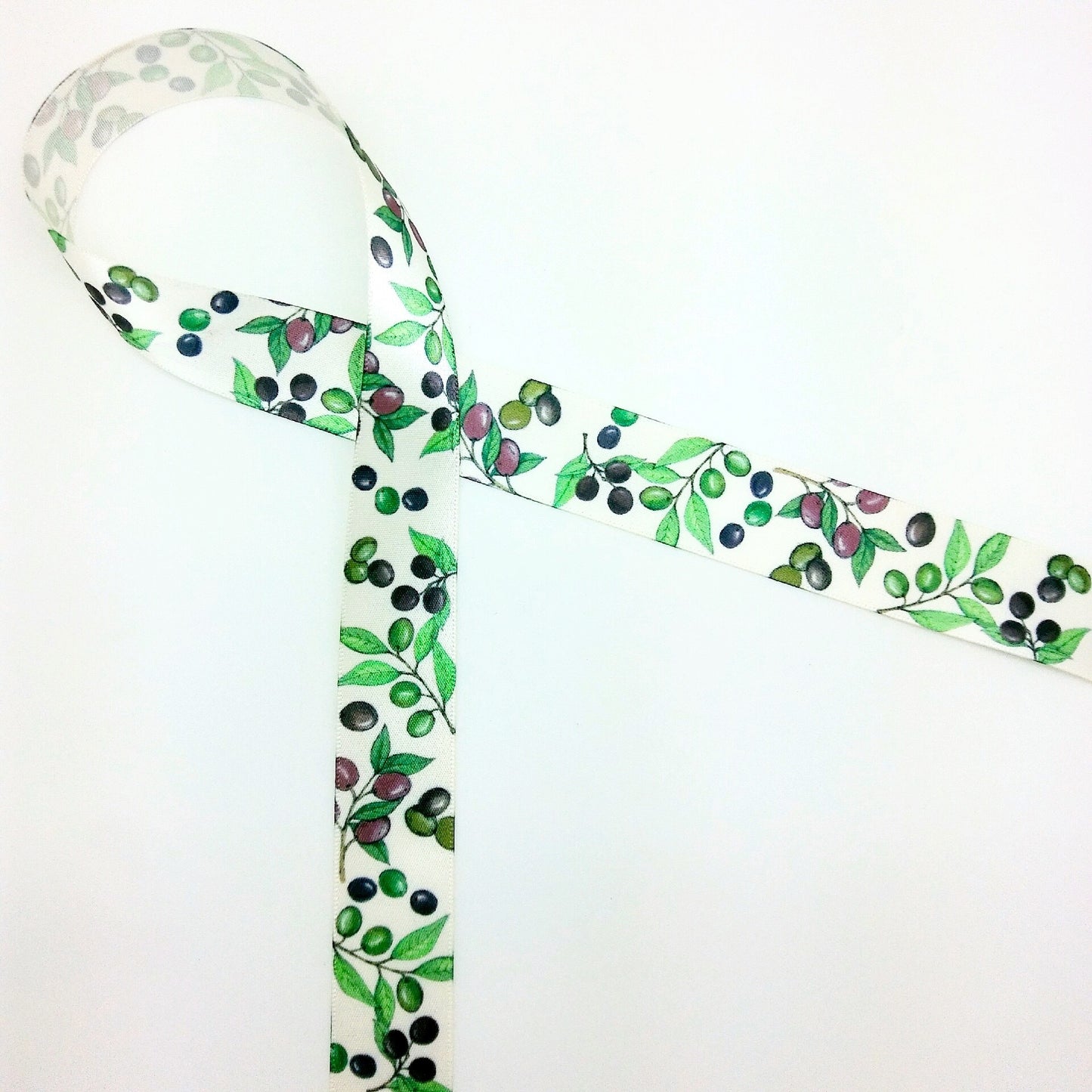 Olives Ribbon in dark purple and green on 5/8", 7/8", and 1.5" Antique White single face satin