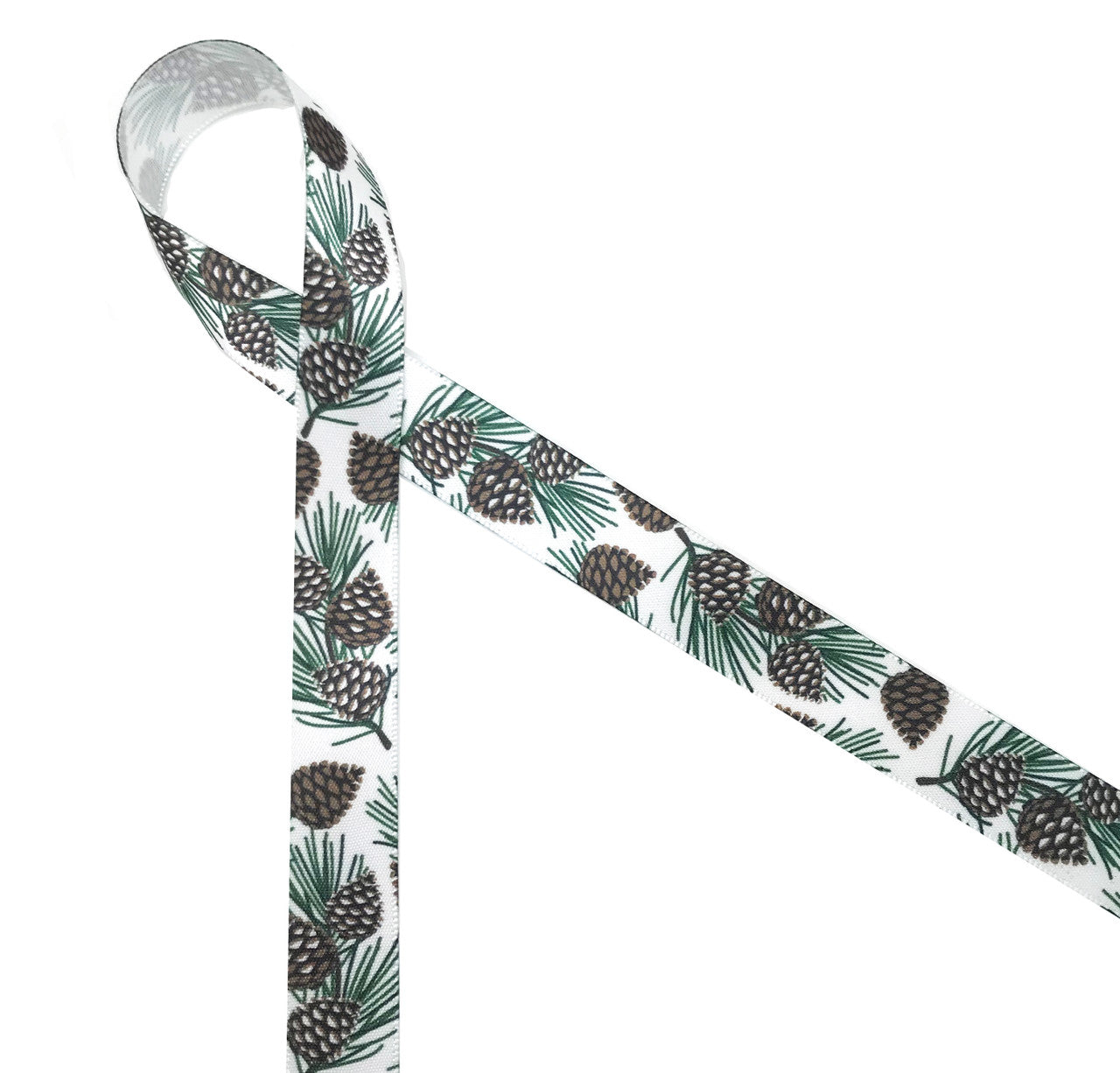 Pine cones, needles and branches on a white background printed on 5/8" white single face satin ribbon is the perfect ribbon for gifts, decor, woodland themed parties, favors , cookies and cake pops all Winter long. This ribbon is a perfect addition to any Woodland themed craft or sewing project too! All our ribbon is designed and printed in the USA