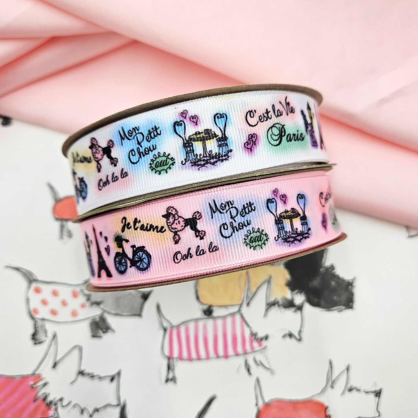 Paris ribbon with images of Paris scenes printed on 7/8" blush double face satin and grosgrain