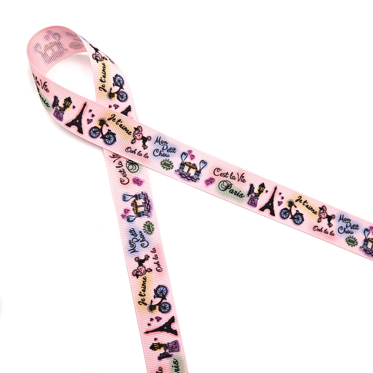 Paris ribbon with images of Paris scenes printed on 7/8" blush double face satin and grosgrain