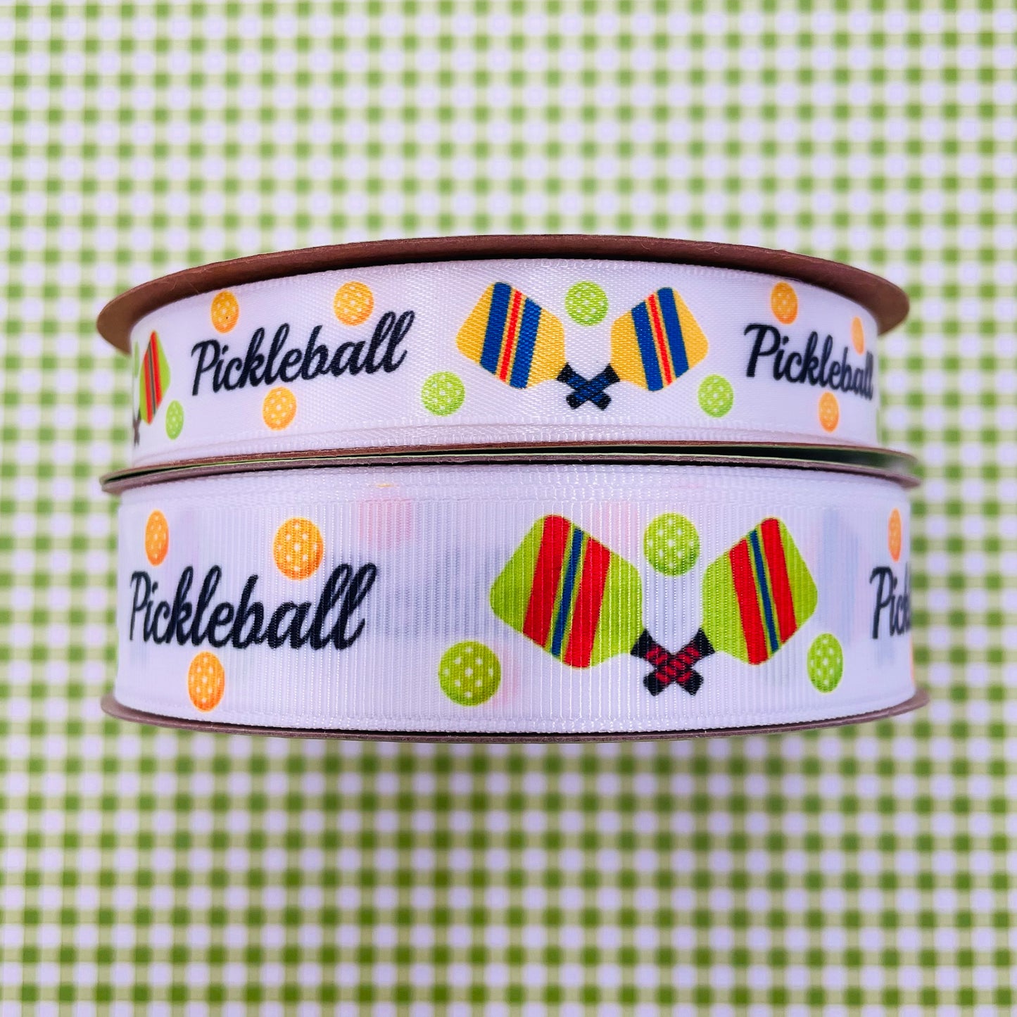Pickleball Ribbon with green and yellow balls and paddles printed on 5/8" white satin and 7/8" grosgrain