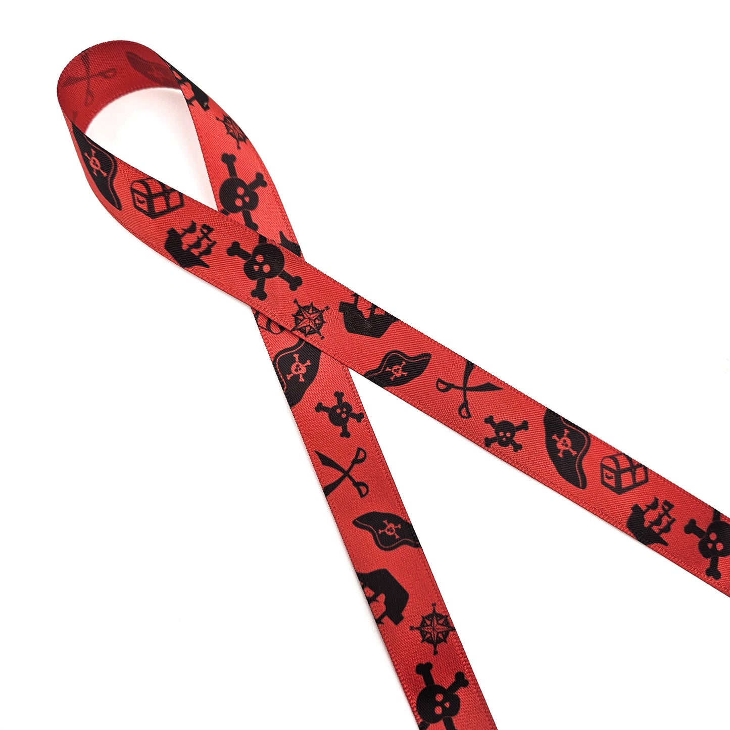 Pirate Ribbon silhouettes in black on 5/8" red single face satin ribbon