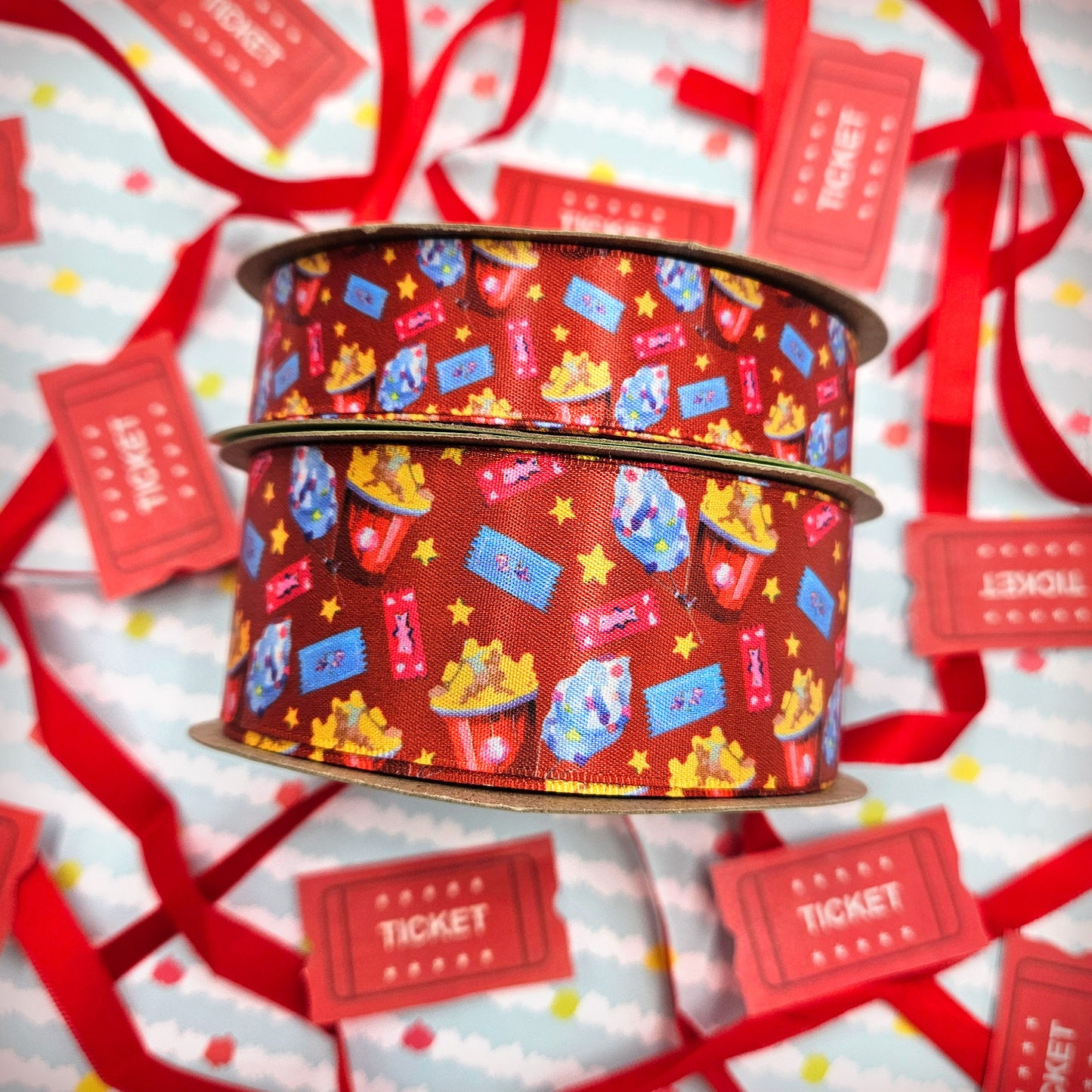Popcorn ribbon with cotton candy, carnival tickets and yellow stars printed on 7/8" and 1.5" white single face satin