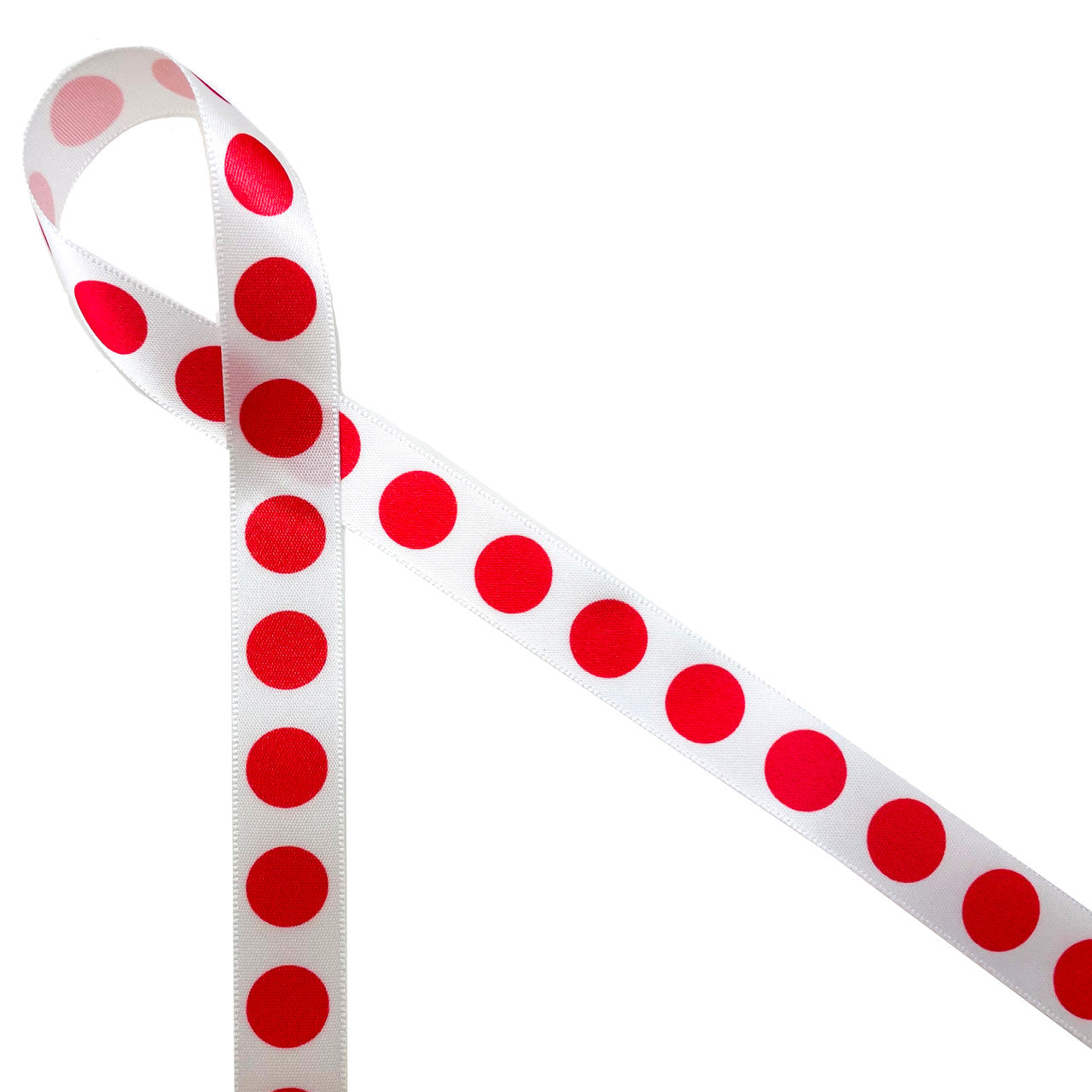 Large red dots in a row printed on 5/8" white single face satin ribbon is versatile ribbon for so many occasions! This is a fun ribbon for birthdays, Christmas, and Valentine's Day. This is a great ribbon for gift wrap, gift baskets, party decor, party favors, cookies, cake pops and candy shops. Be sure to have this ribbon on hand for any red and white event that may arise! All our ribbon is designed and printed in the USA