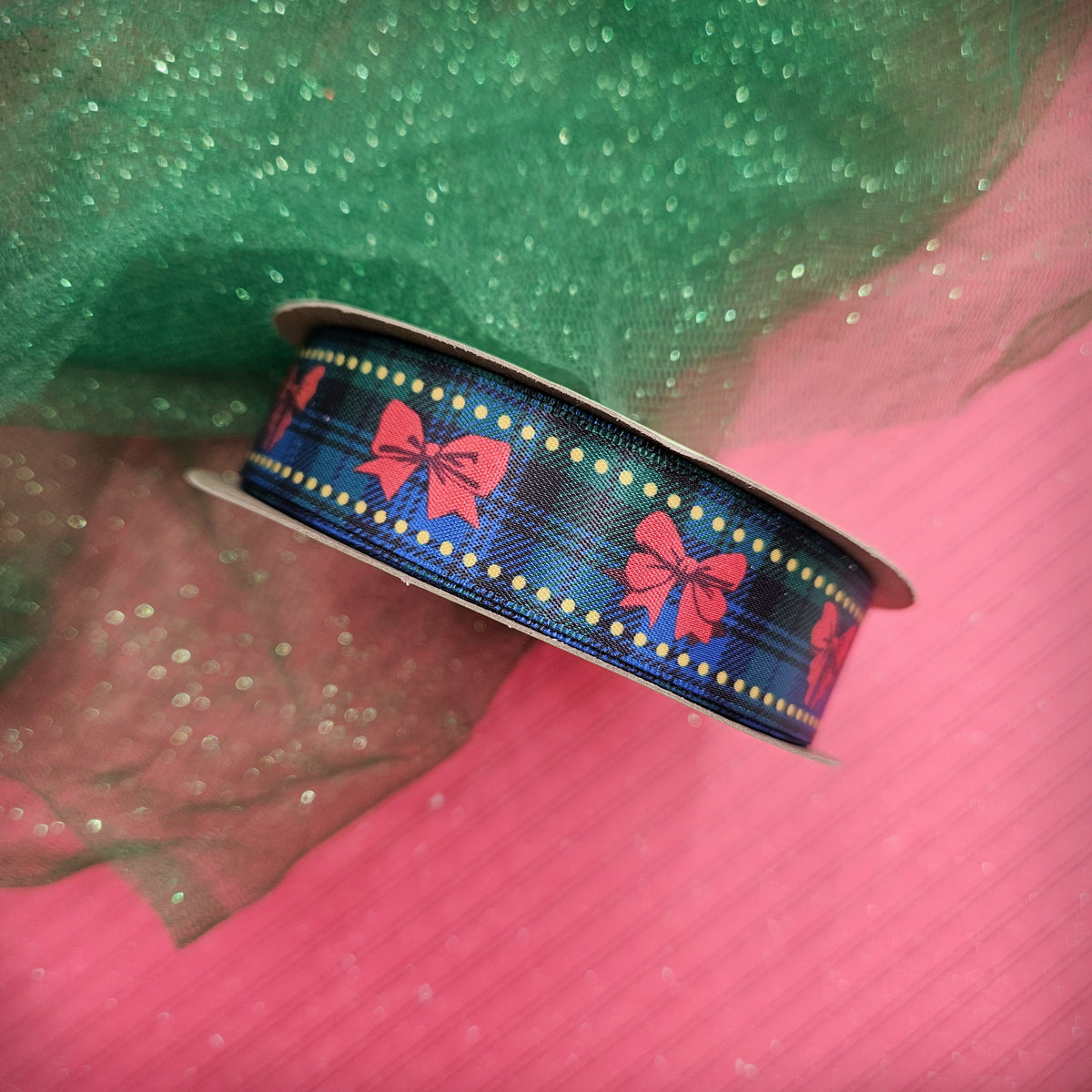 Christmas ribbon red bows on a black and blue watch plaid background printed on 5/8" single face satin