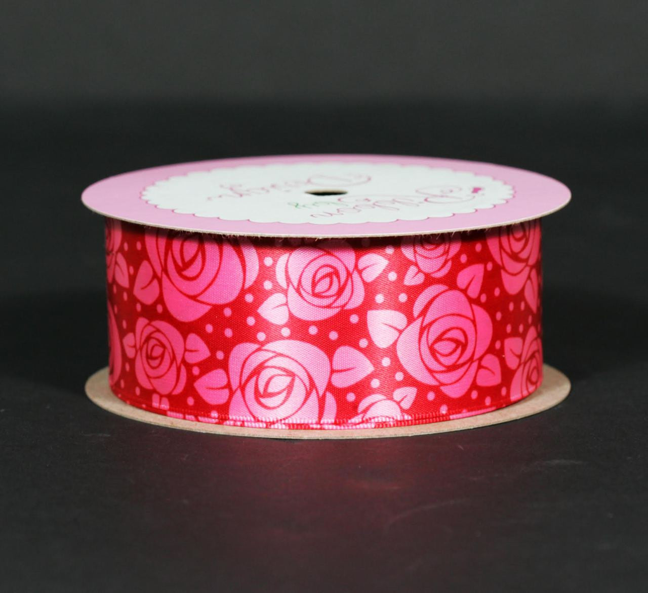 Stylized roses in hot pink on a deep pink background are the sweetest way to surprise your Valentine. This ribbon is 1.5" wide in hot pink single face satin ribbon.