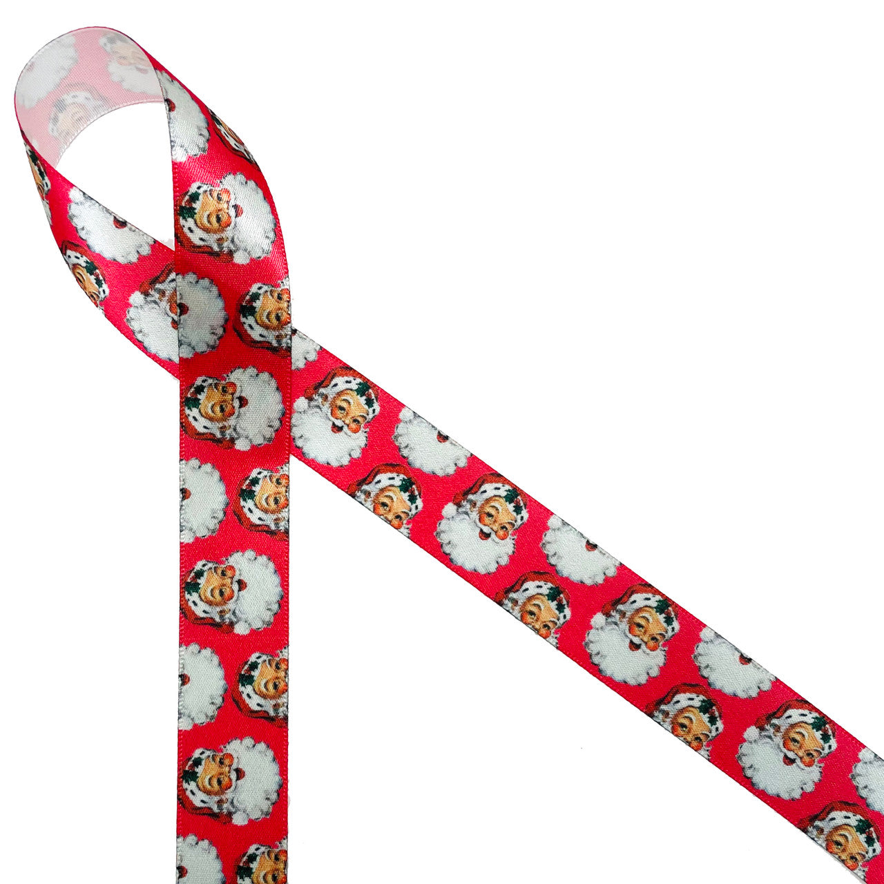 Our vintage Santa with his rosy cheeks, big smile and fluffy beard will take you back to an old fashioned Christmas. Make your gifts extra special with this fun ribbon! Designed and printed in the USA