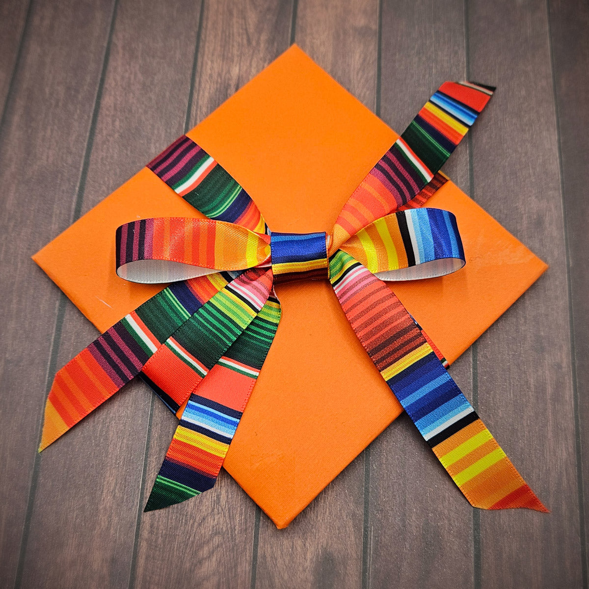 Serape Stripe Ribbon primary color stripes in red, orange, yellow, green, blue and purple  for Southwestern themes printed on 5/8" white single face satin