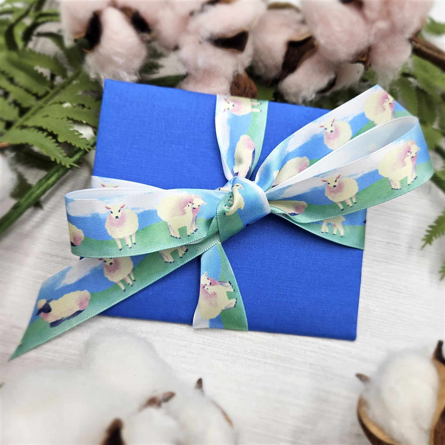Sheep and lambs ribbon for Easter and Spring gifts, baskets, party favors and crafts printed on 7/8" white single face satin