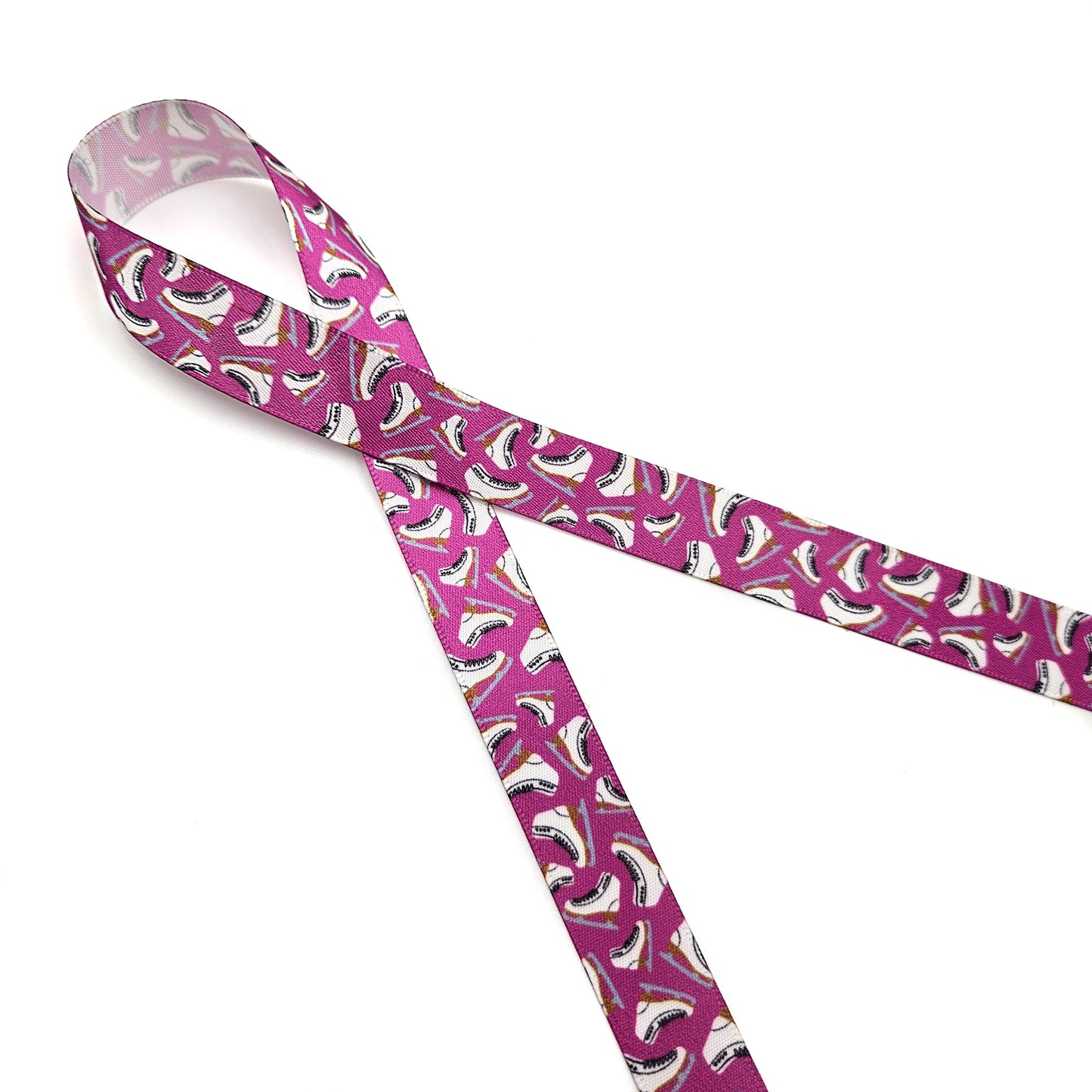 Figure Skates tossed on a blue or pink background printed on 5/8" and 7/8" white satin ribbon