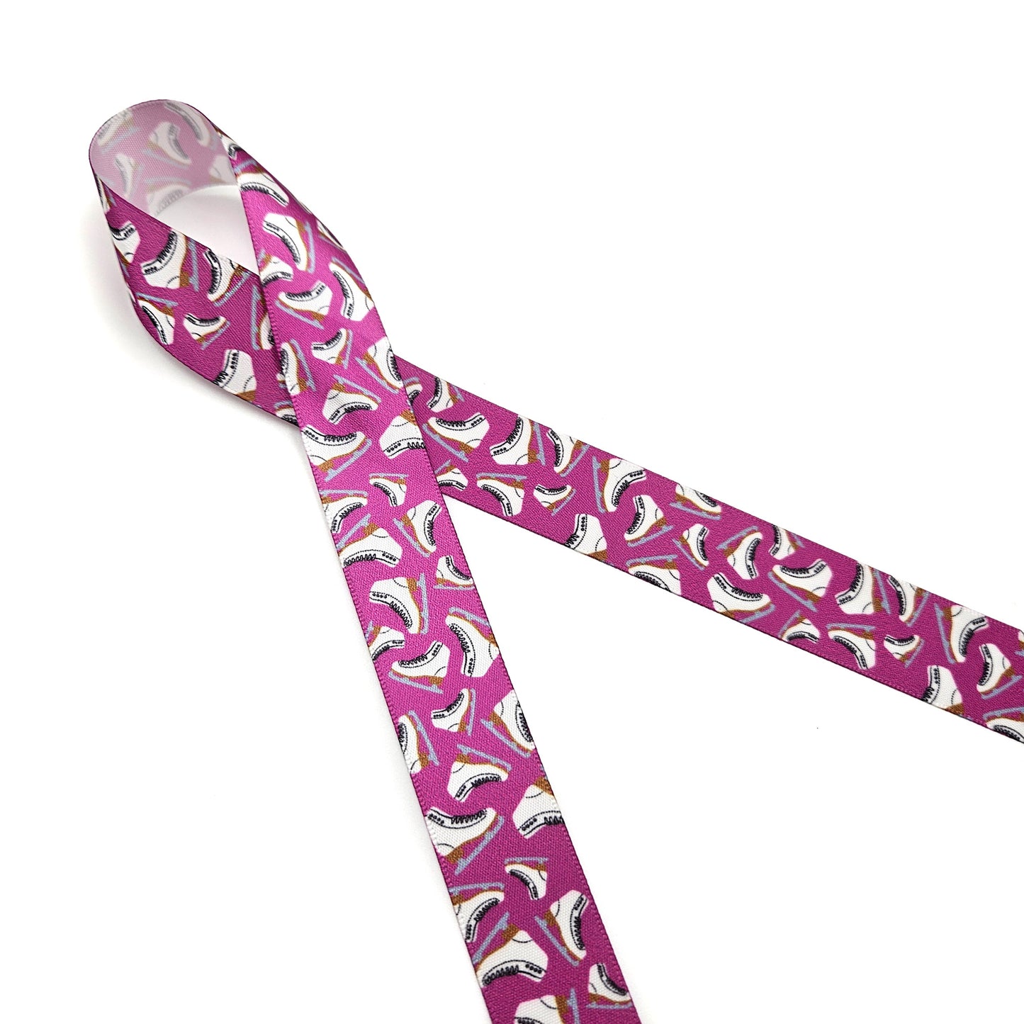 Figure Skates tossed on a blue or pink background printed on 5/8" and 7/8" white satin ribbon