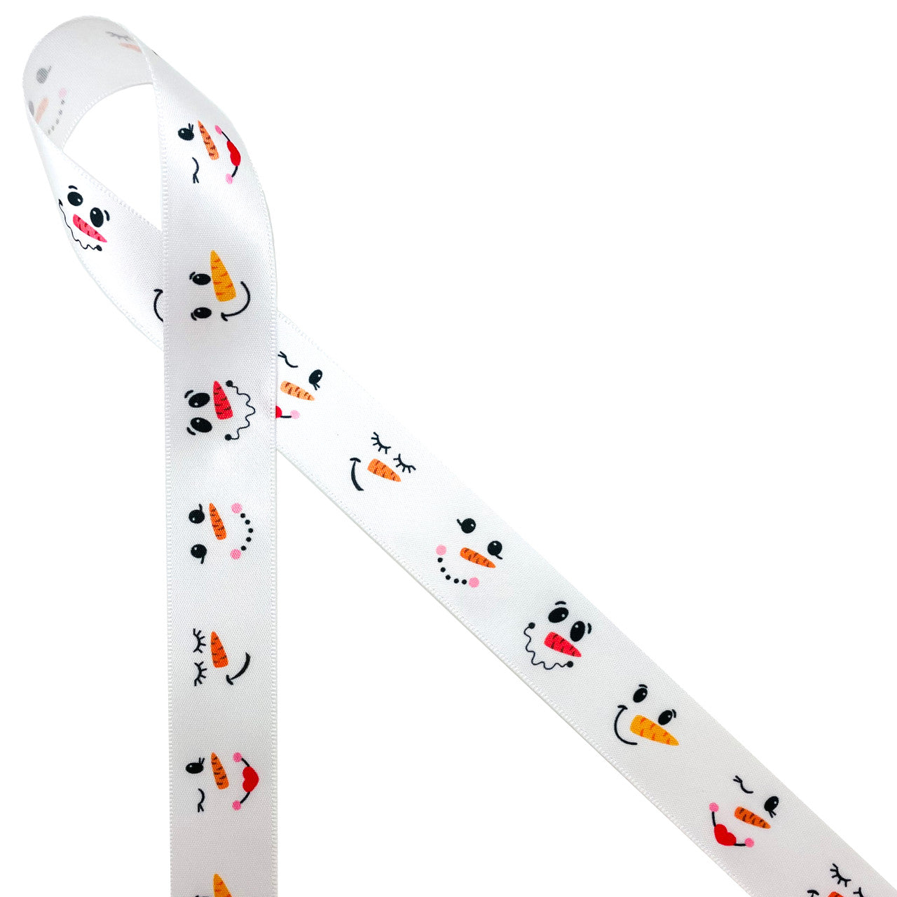 Snowman faces with happy expressions printed on  7/8" white single face satin is such a fun Winter ribbon. This is a  fabulous ribbon for Holiday gift wrap, party decor, party favors, candy shops, cookies, cake pops and  chocolatiers. Be sure to  have this fun ribbon on hand all Winter long for crafting and sewing projects too. All  our ribbons are designed and printed in the USA