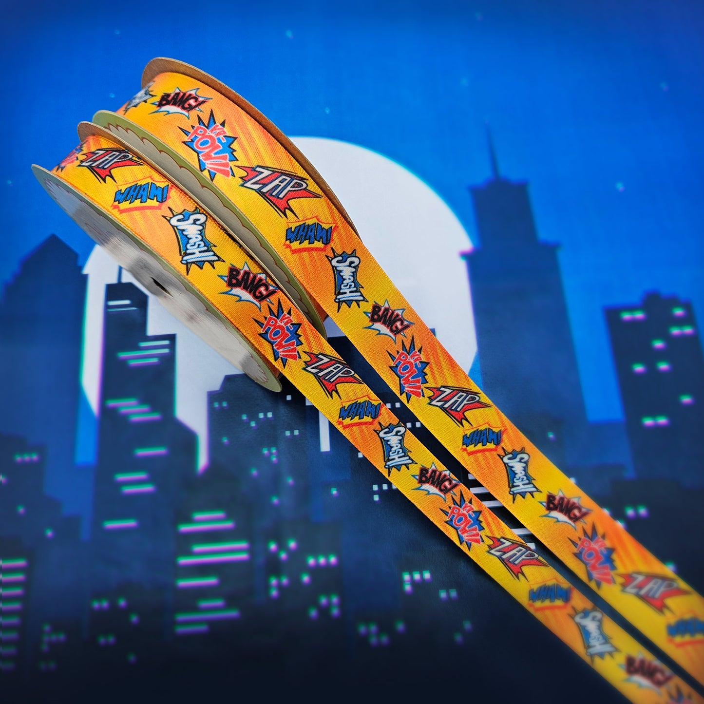 Super Hero Ribbon Zap, Pow, Bang, Smash, Wham on a bright orange background printed on 5/8" and 7/8" single face satin