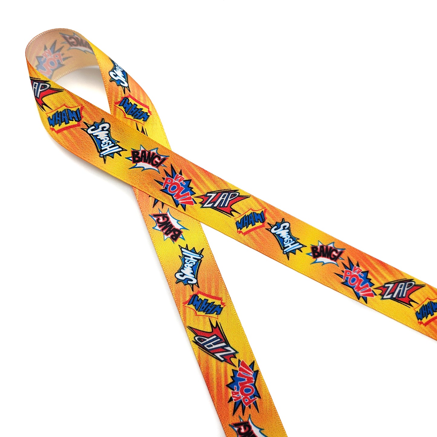 Super Hero Ribbon Zap, Pow, Bang, Smash, Wham on a bright orange background printed on 5/8" and 7/8" single face satin