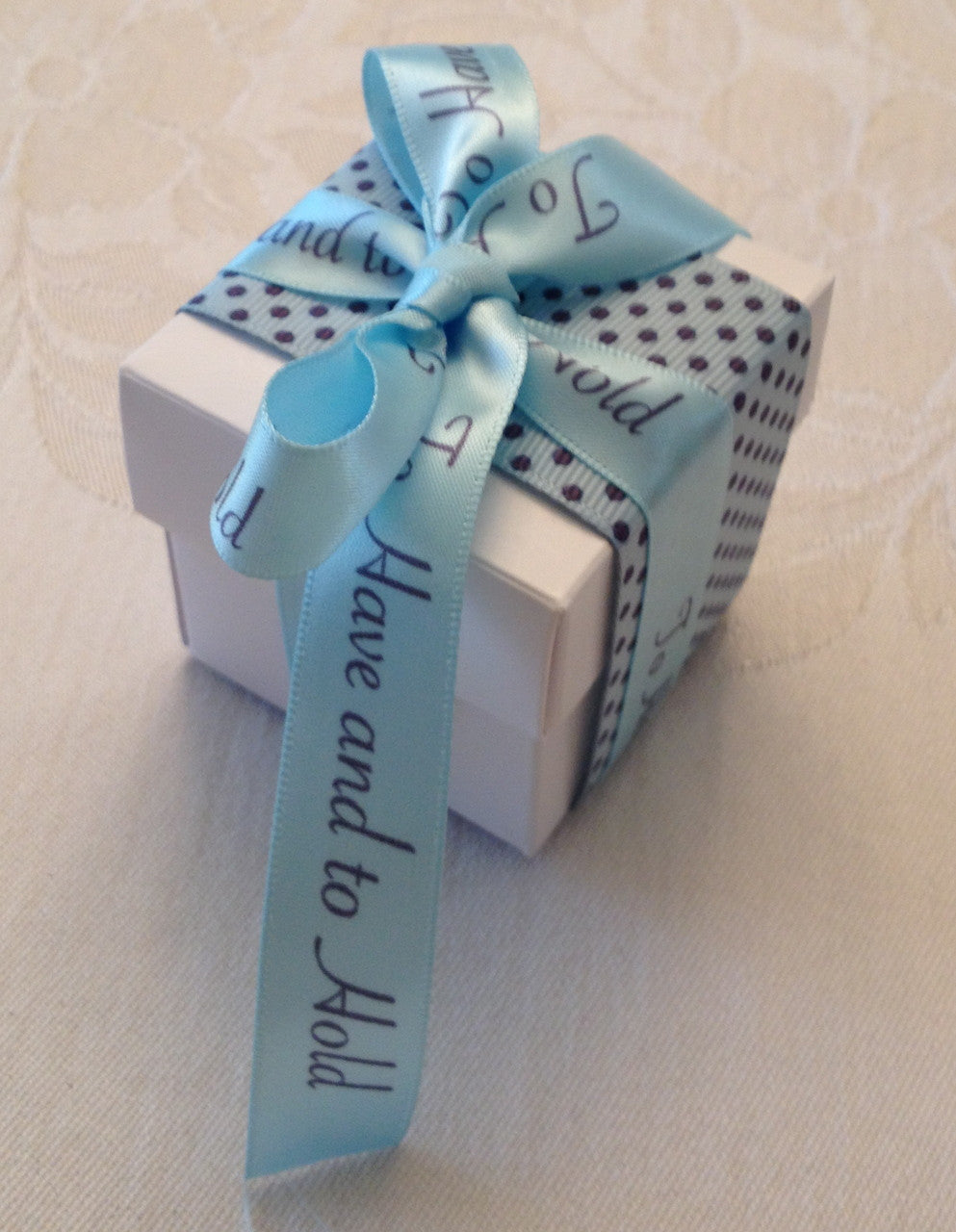 Our pin dot grosgrain looks so handsome with our satin To Have and To Hold ribbon. Such a beautiful vow to share with your guests on your favor boxes.